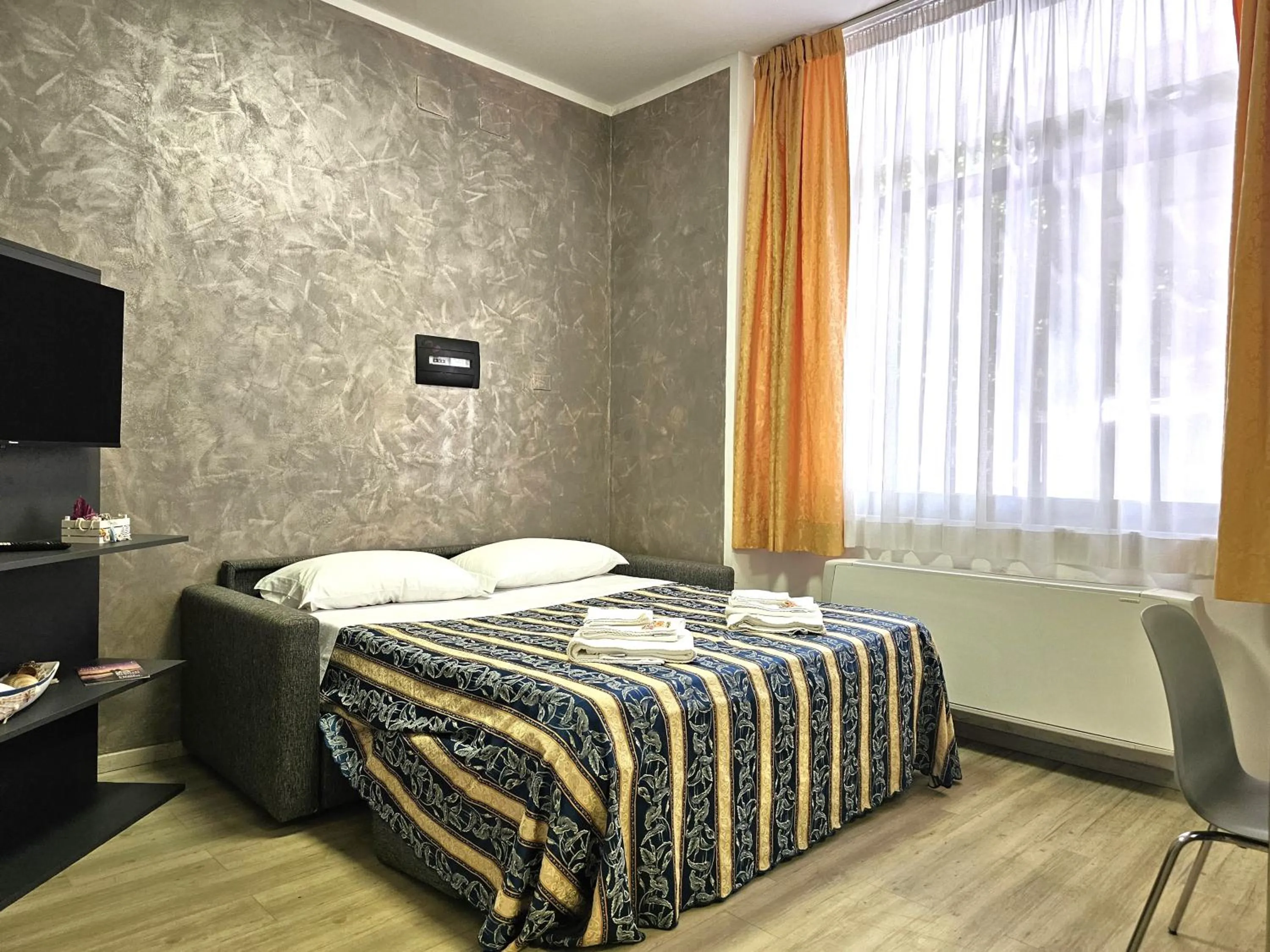 Living room, Bed in Residence Millennium