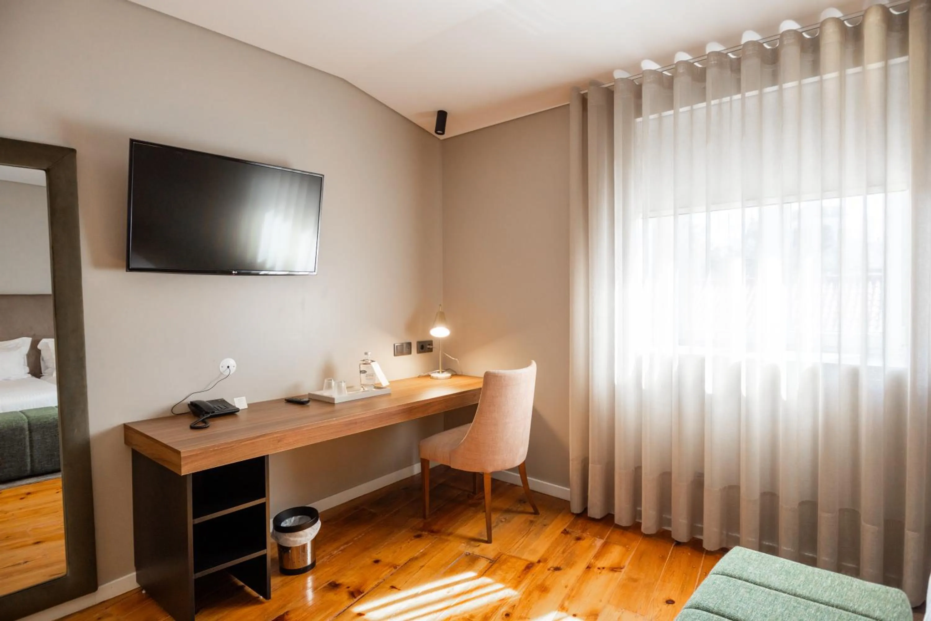 TV and multimedia in Avenida Boutique Hotel