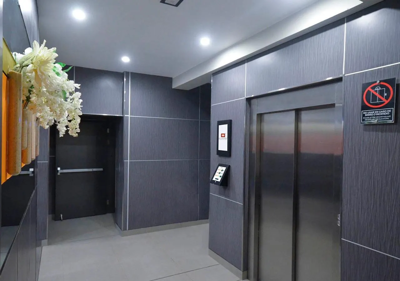 Lobby or reception in qp Hotels Trujillo