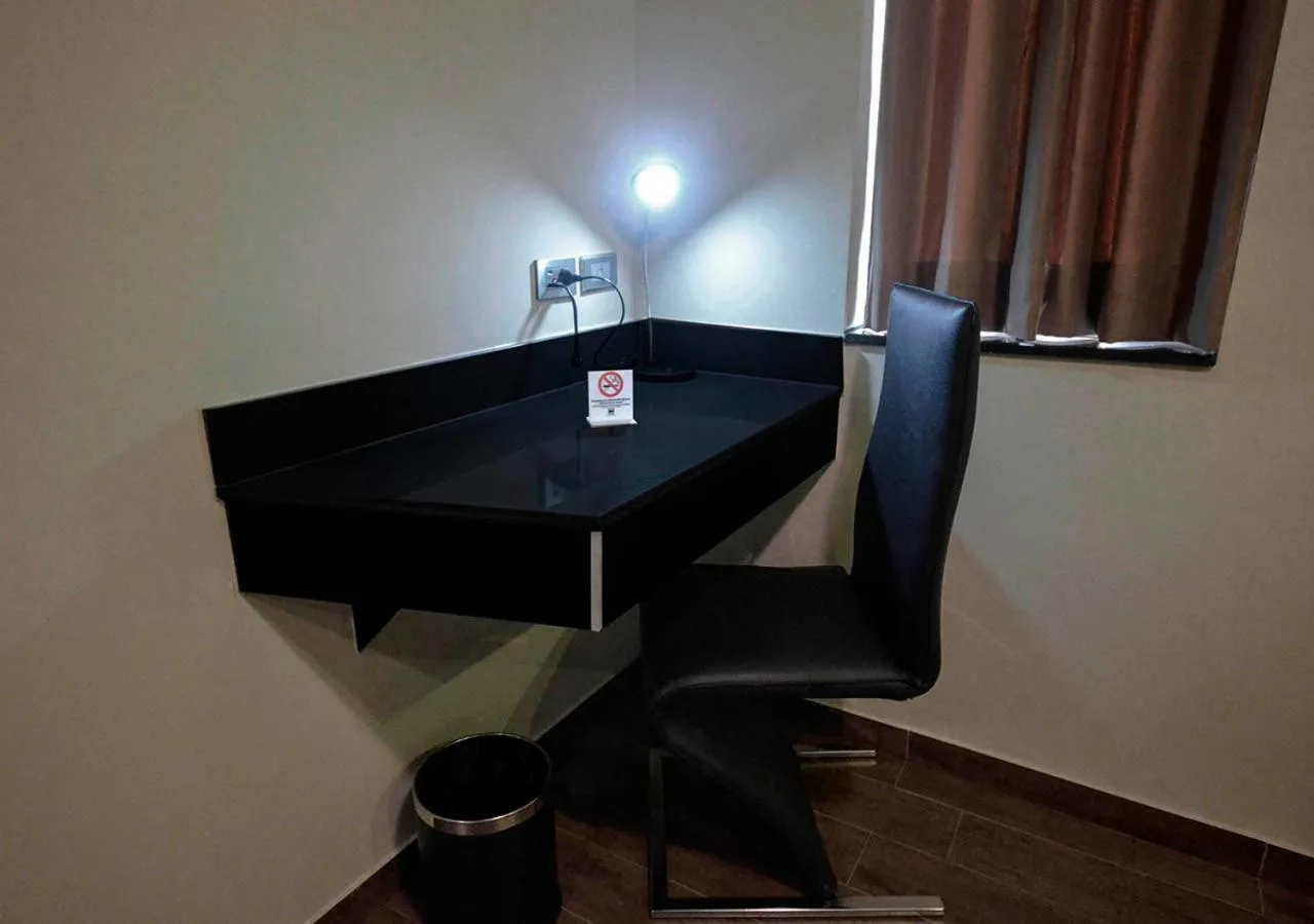 Seating area in qp Hotels Trujillo