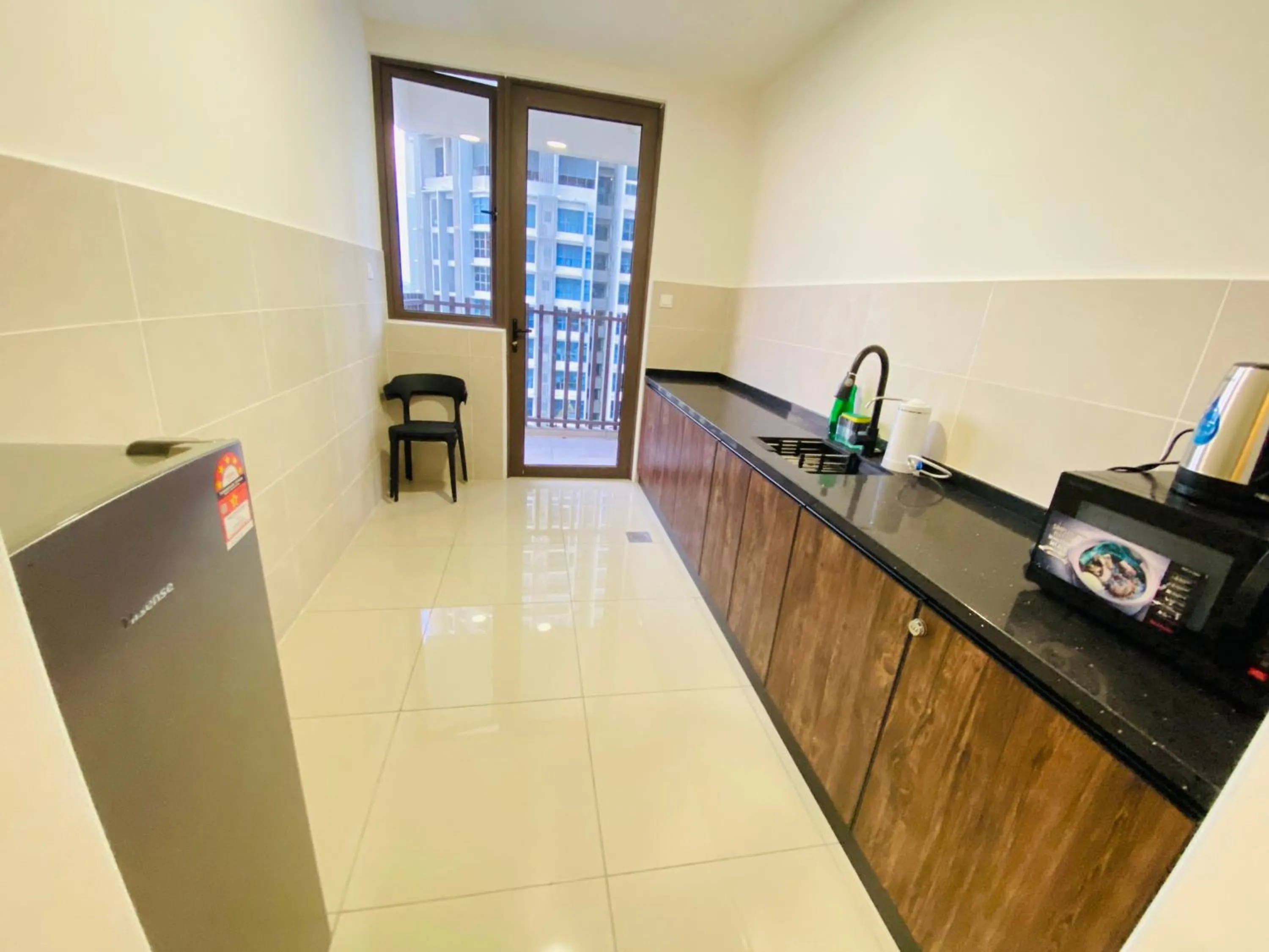 Kitchen or kitchenette in Bali Mutiara By DKK HOMESTAY Malacca