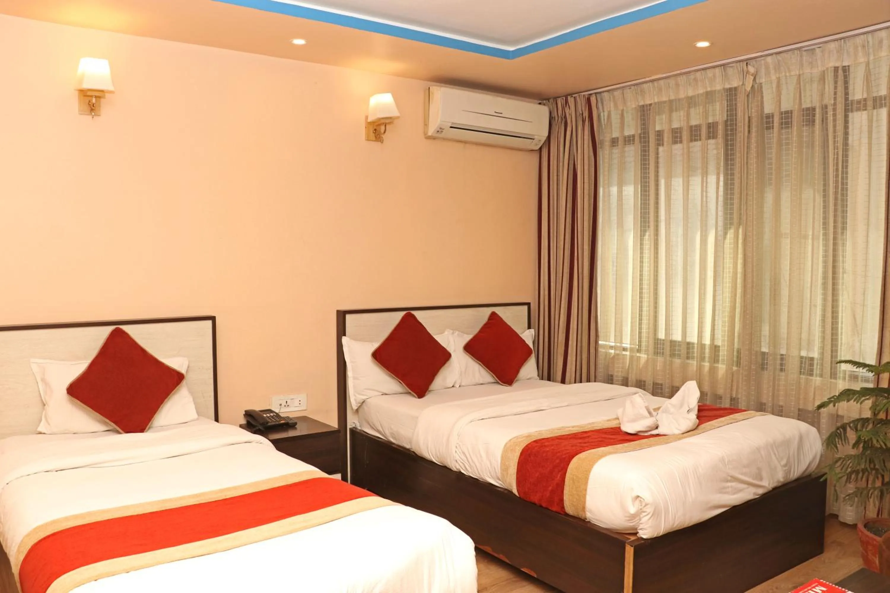 Bed in Hotel Readers Inn Pvt.Ltd