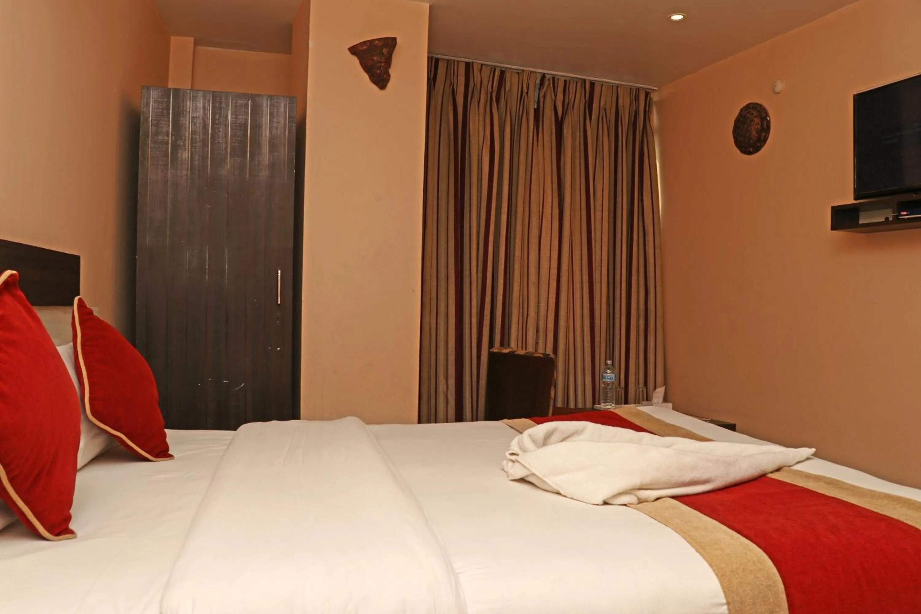 Bed in Hotel Readers Inn Pvt.Ltd