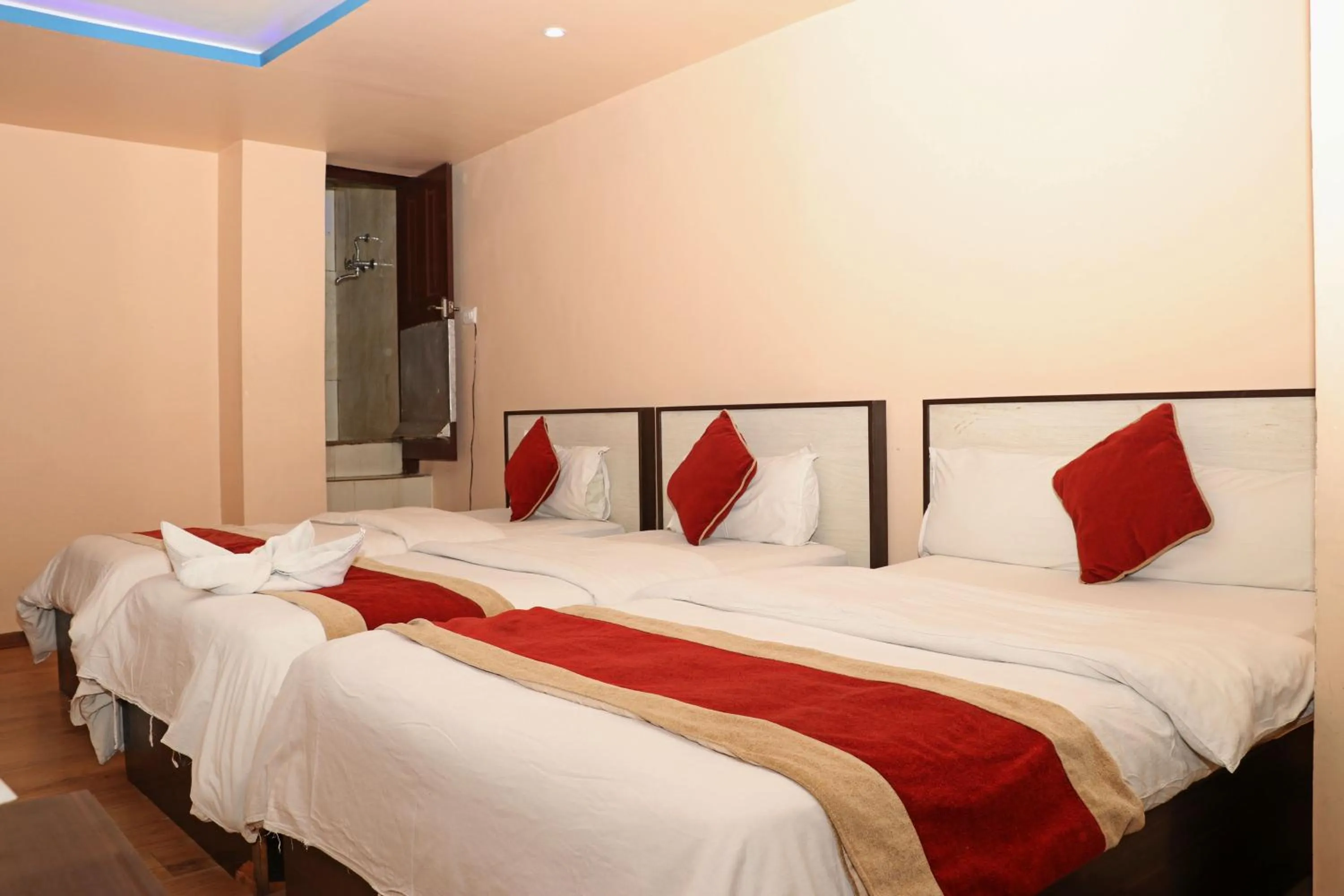 Bed in Hotel Readers Inn Pvt.Ltd