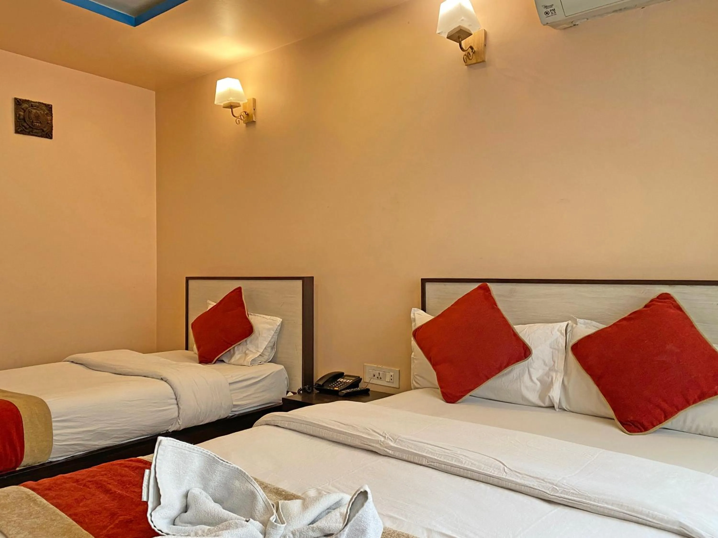 Bed in Hotel Readers Inn Pvt.Ltd