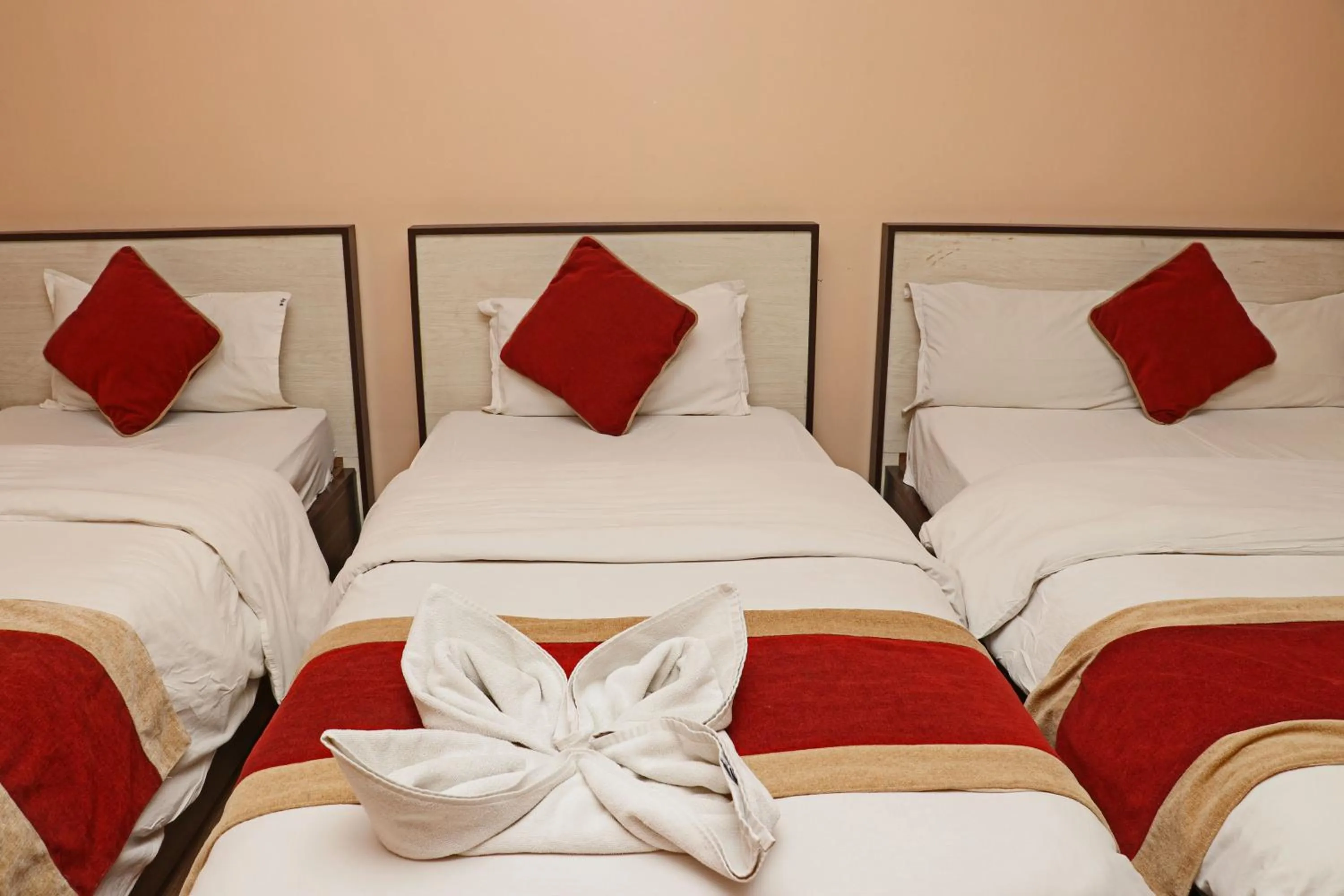 Bed in Hotel Readers Inn Pvt.Ltd