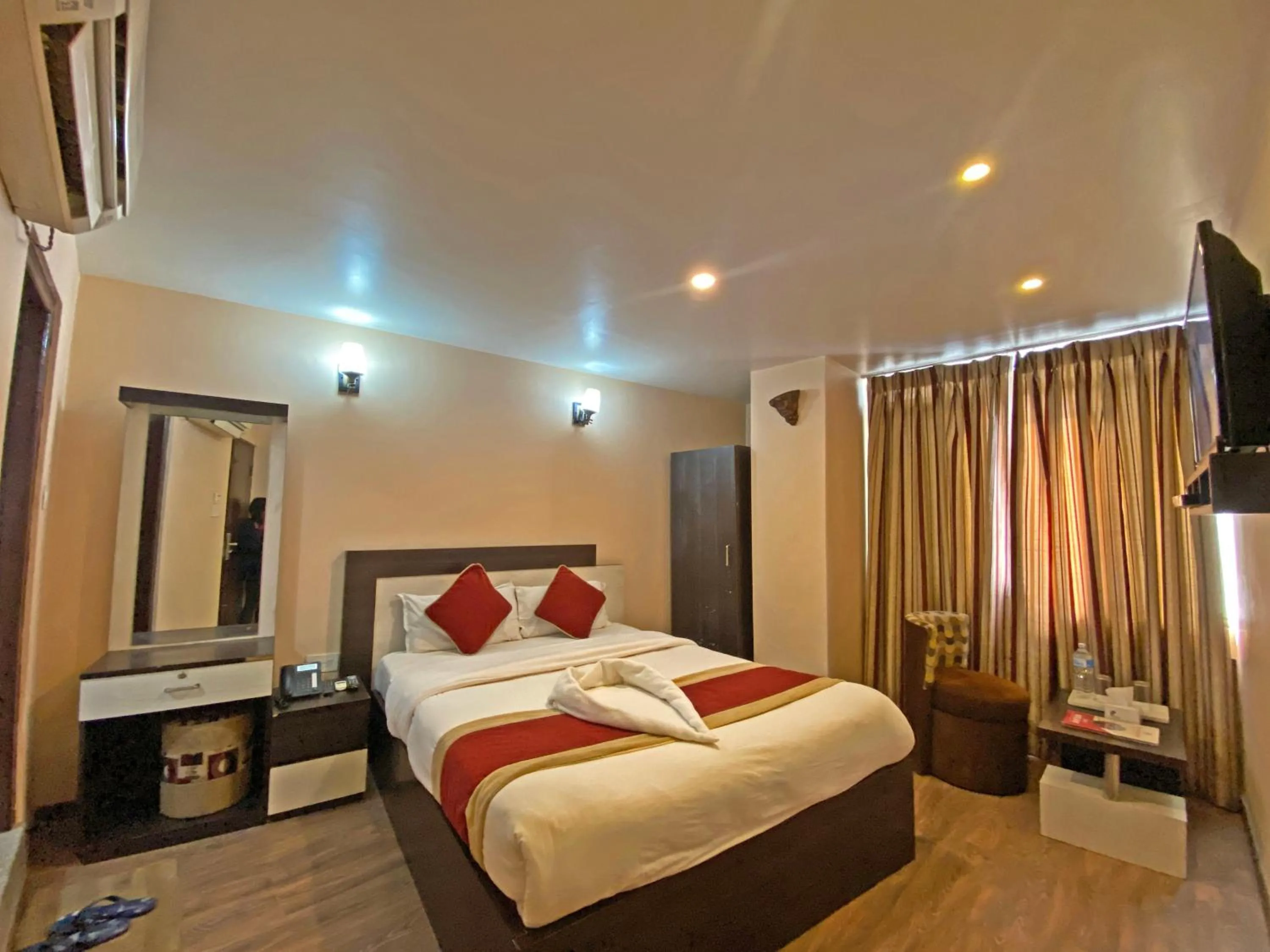 Bedroom in Hotel Readers Inn Pvt.Ltd