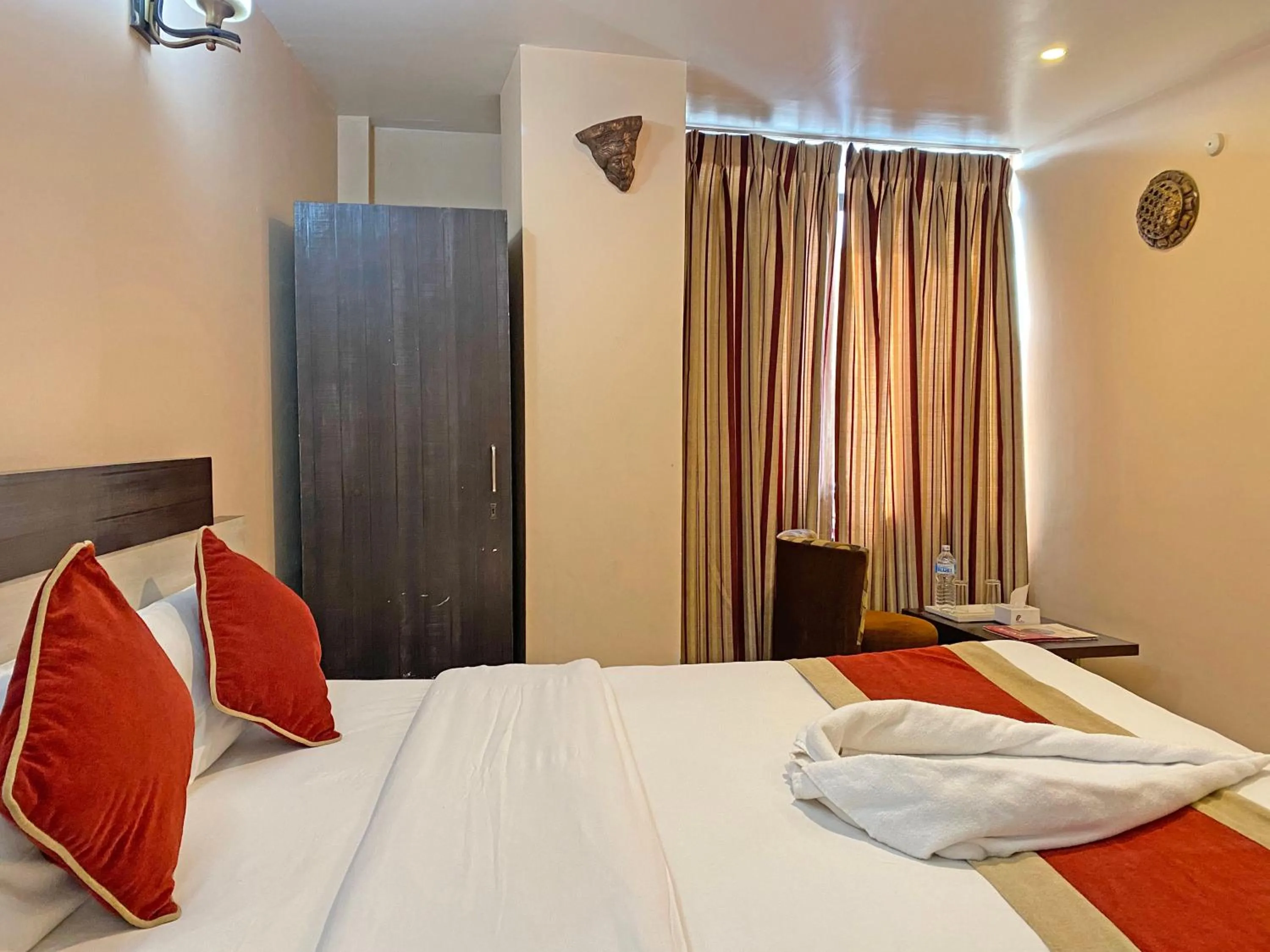 Bed in Hotel Readers Inn Pvt.Ltd