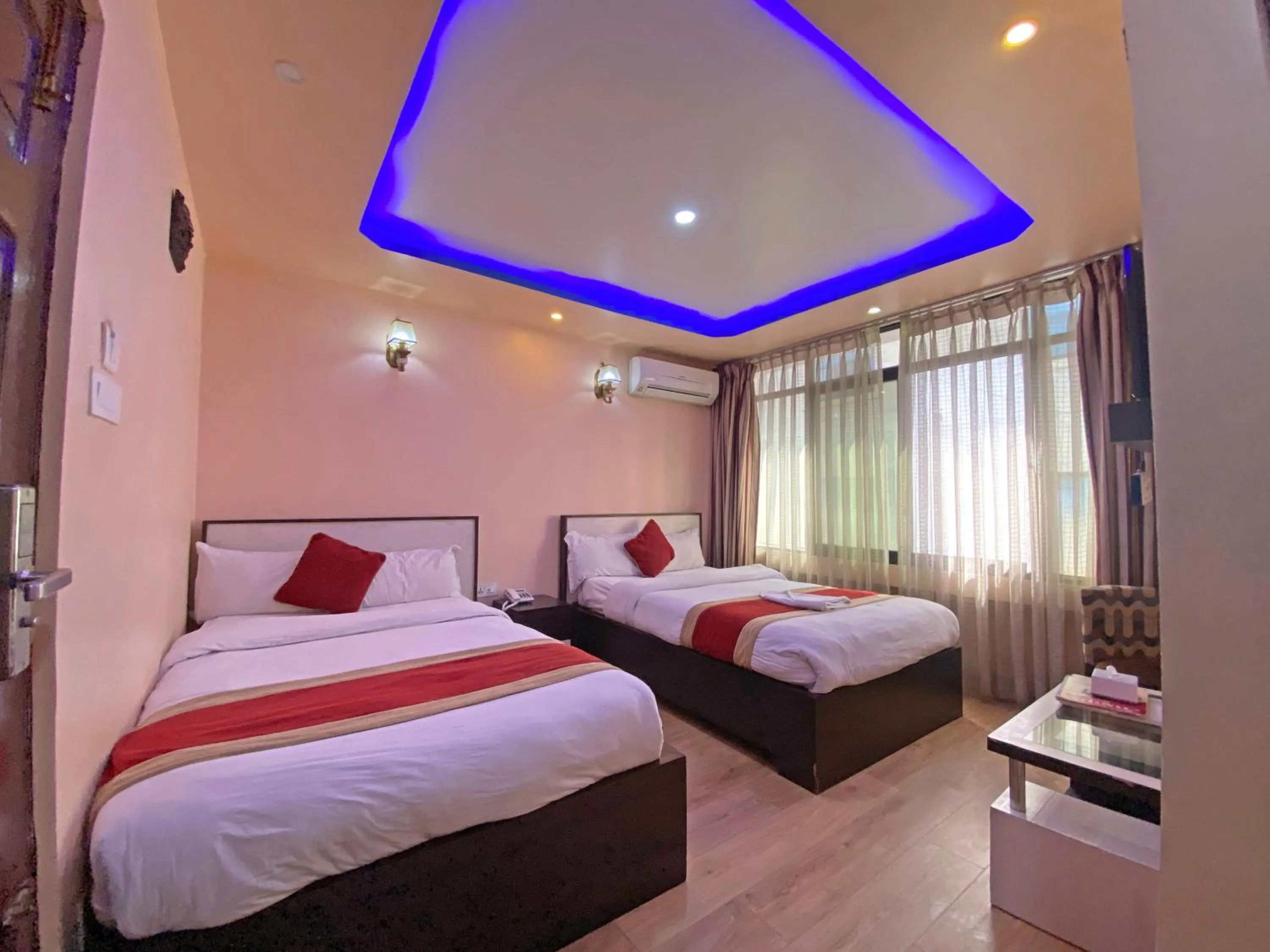 Bed in Hotel Readers Inn Pvt.Ltd