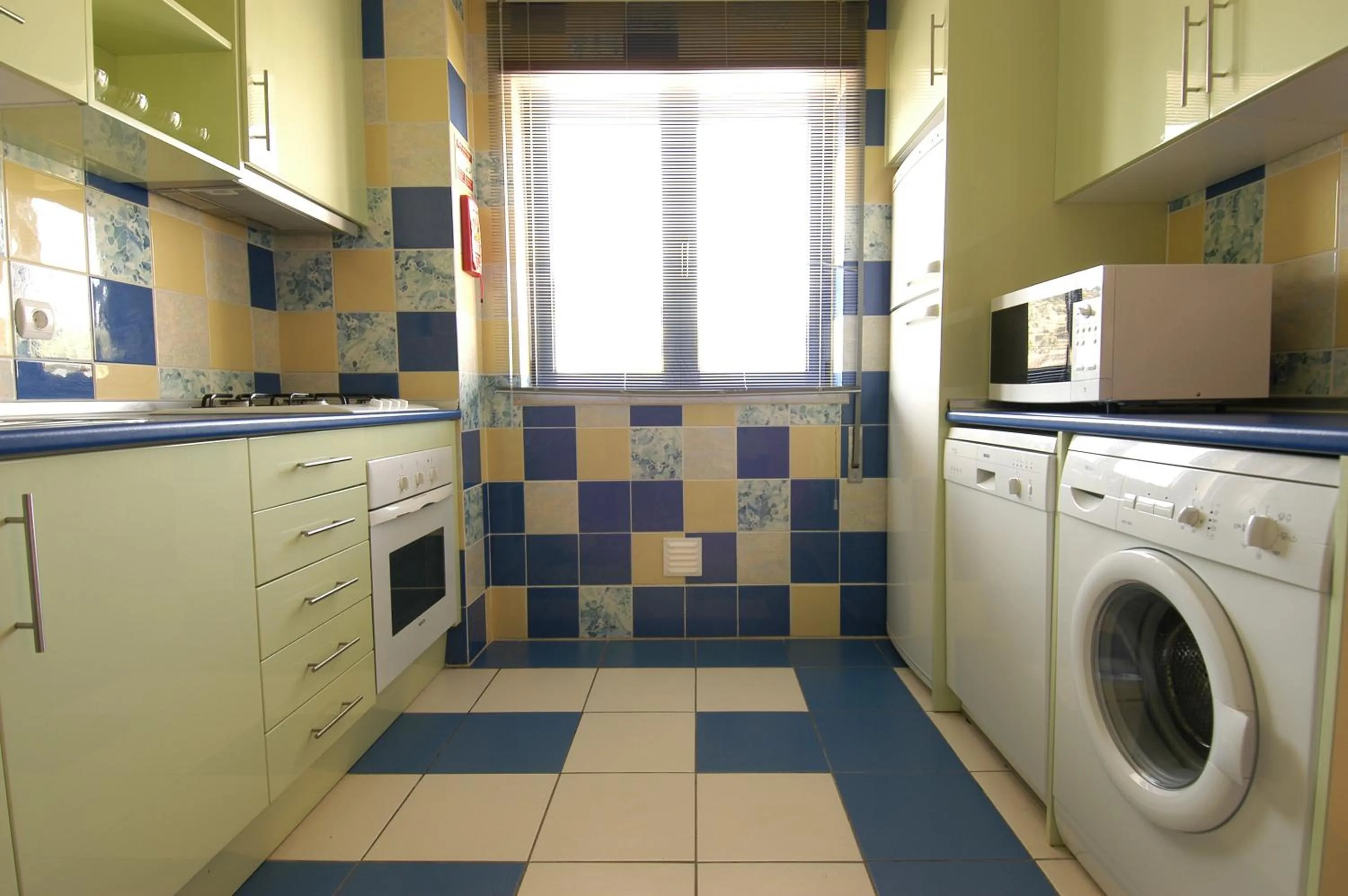 Kitchen or kitchenette in Orada Apartamentos Turísticos - Marina de Albufeira