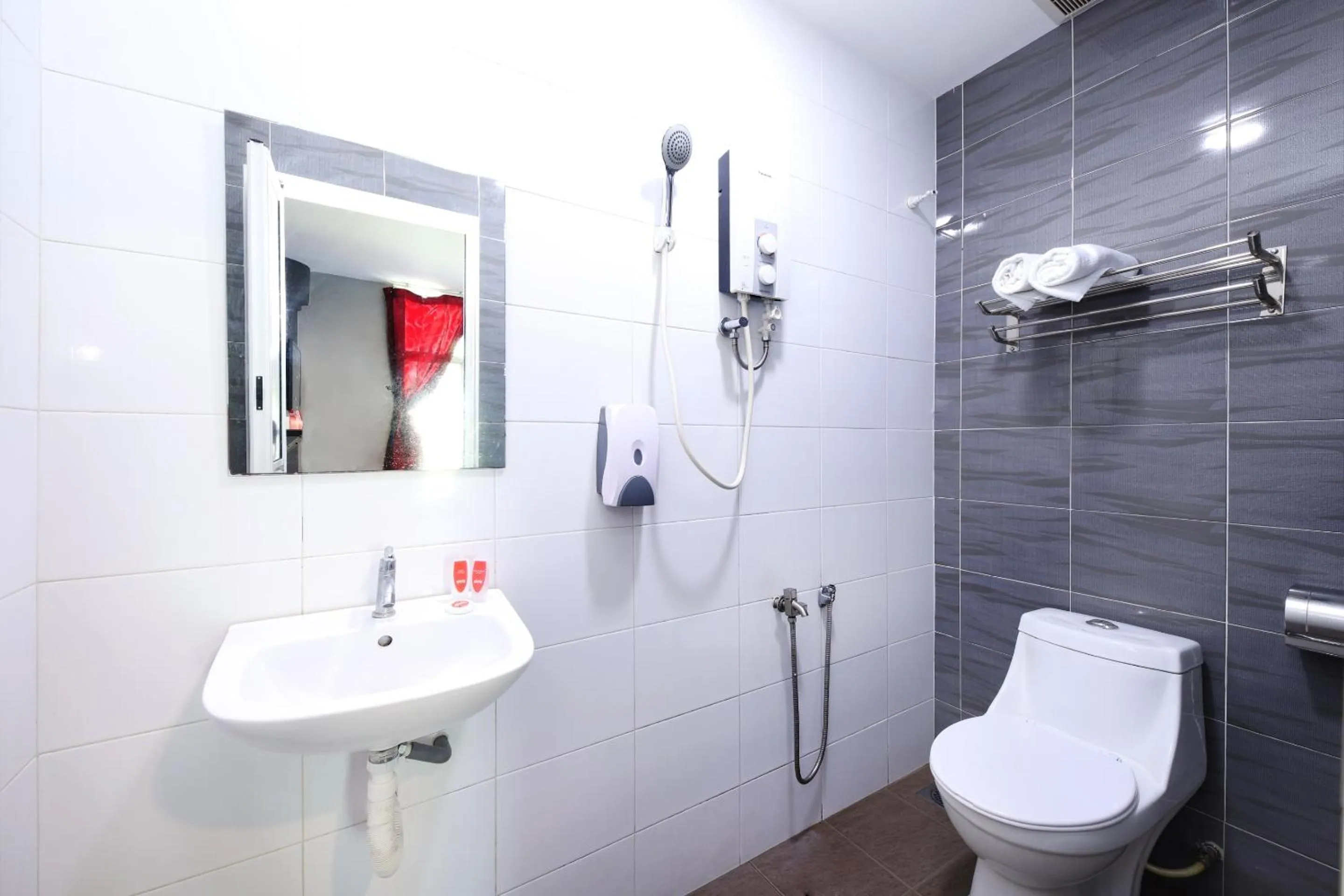 Bathroom in Hotel O 1184 Ho Hotel