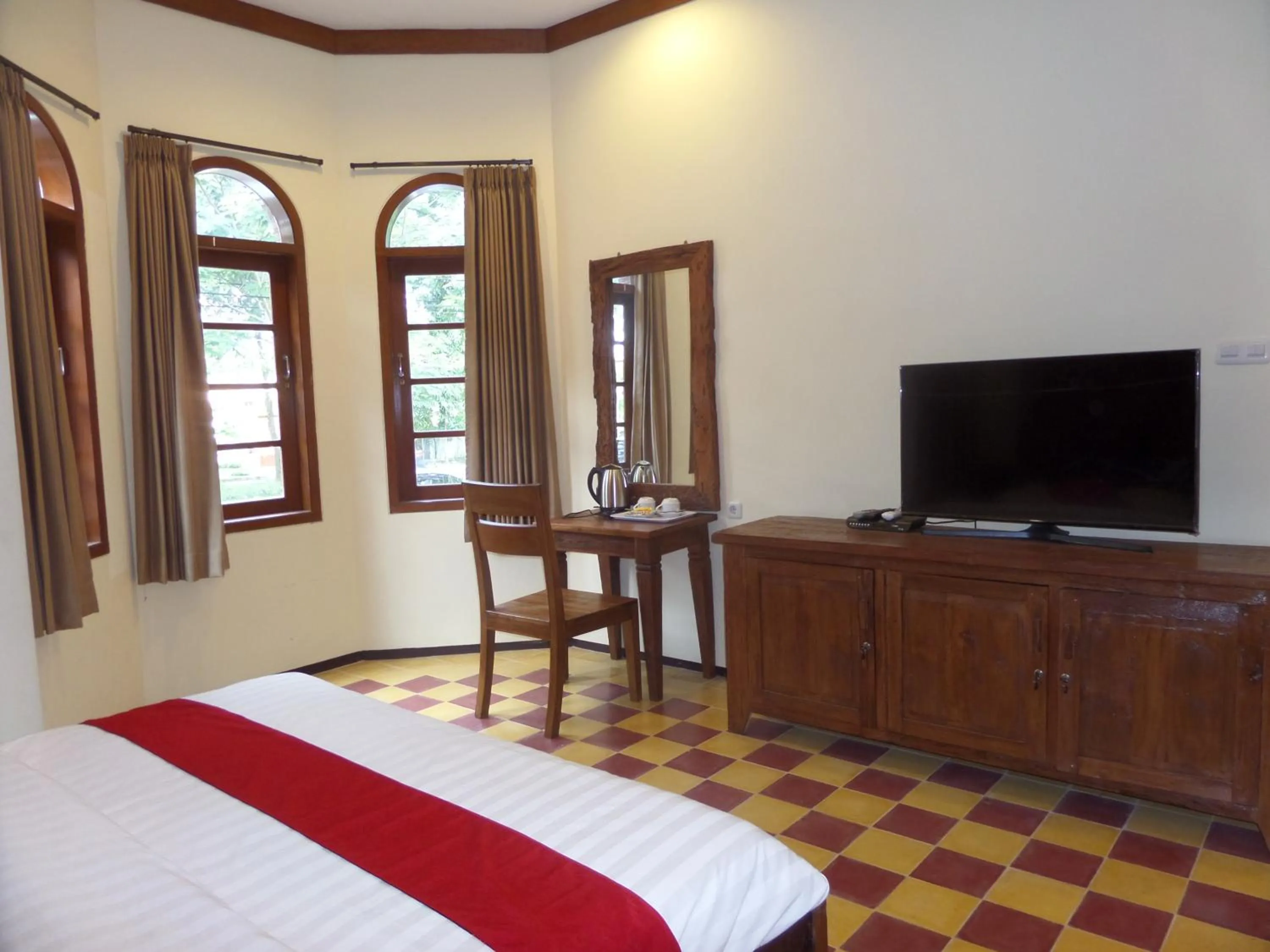 TV and multimedia, Bed in Jacatra Homestay
