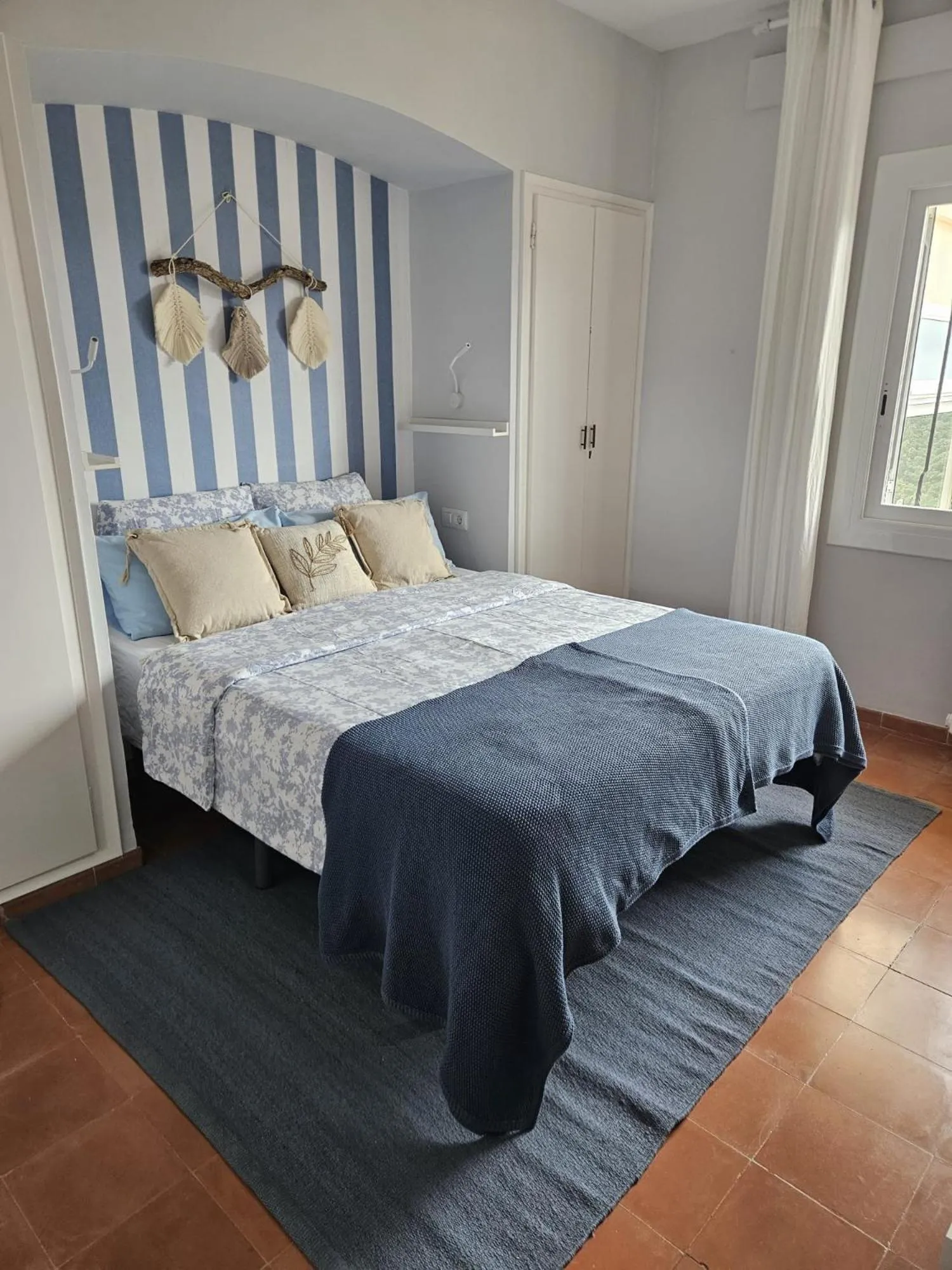 Decorative detail, Bed in La Roqueta Hotel