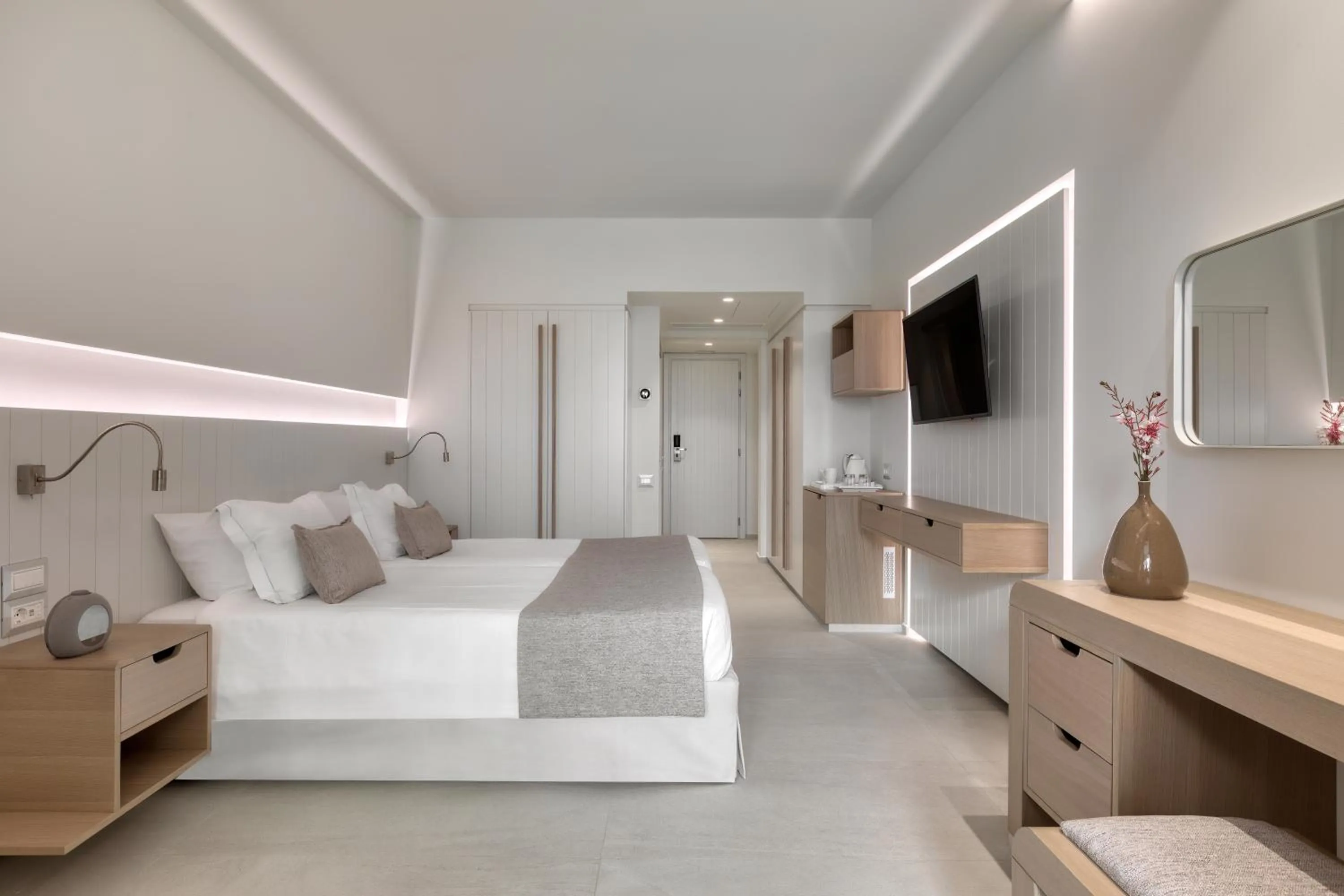 Bed in Neptune Luxury Resort