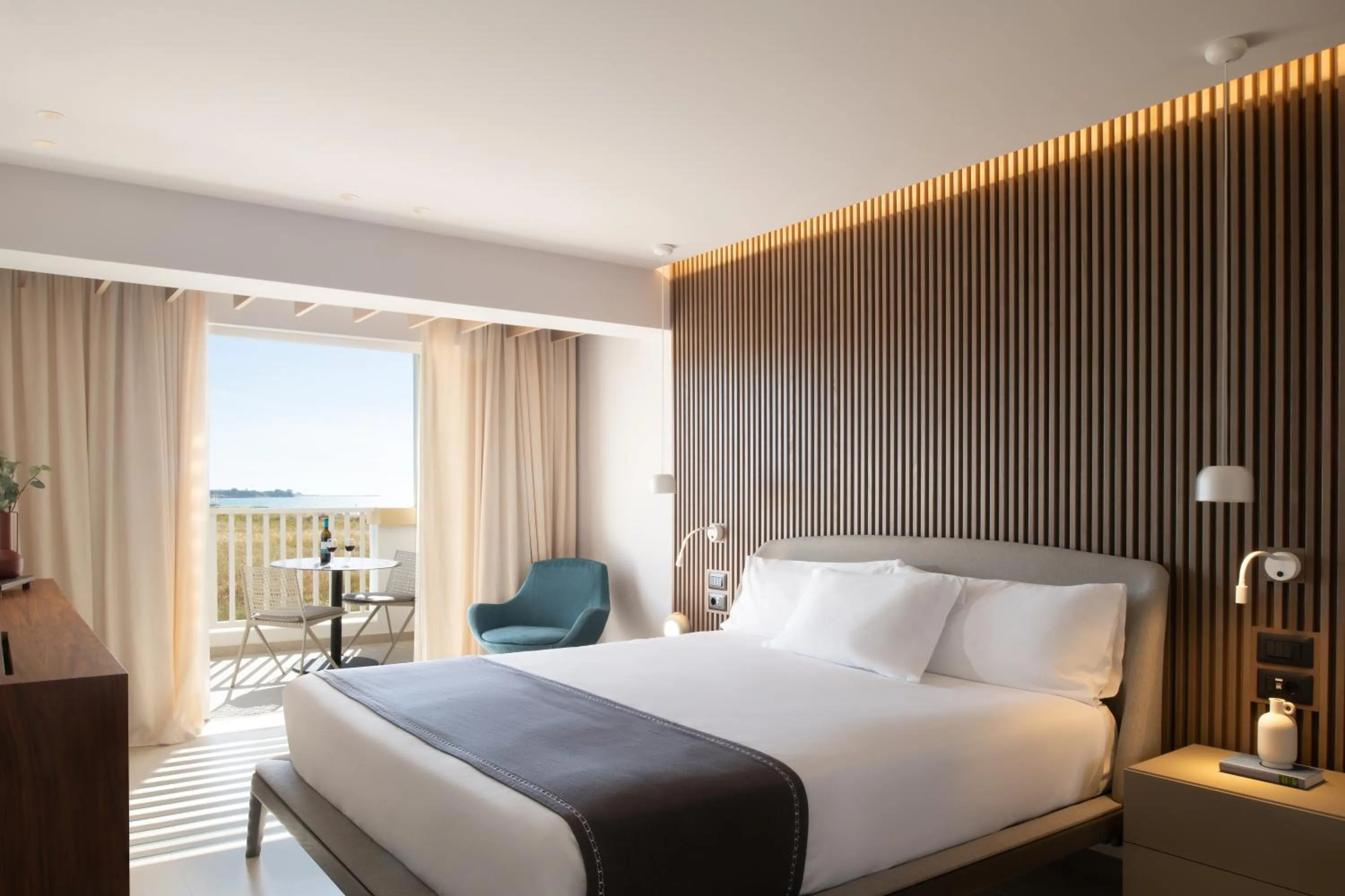 Bed in Neptune Luxury Resort