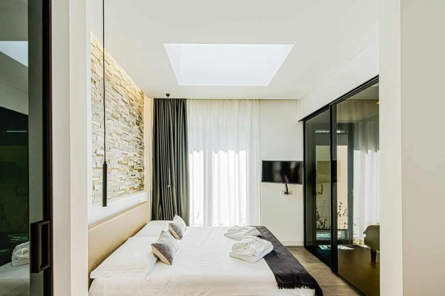 Bed in Acquarella Resort Suite