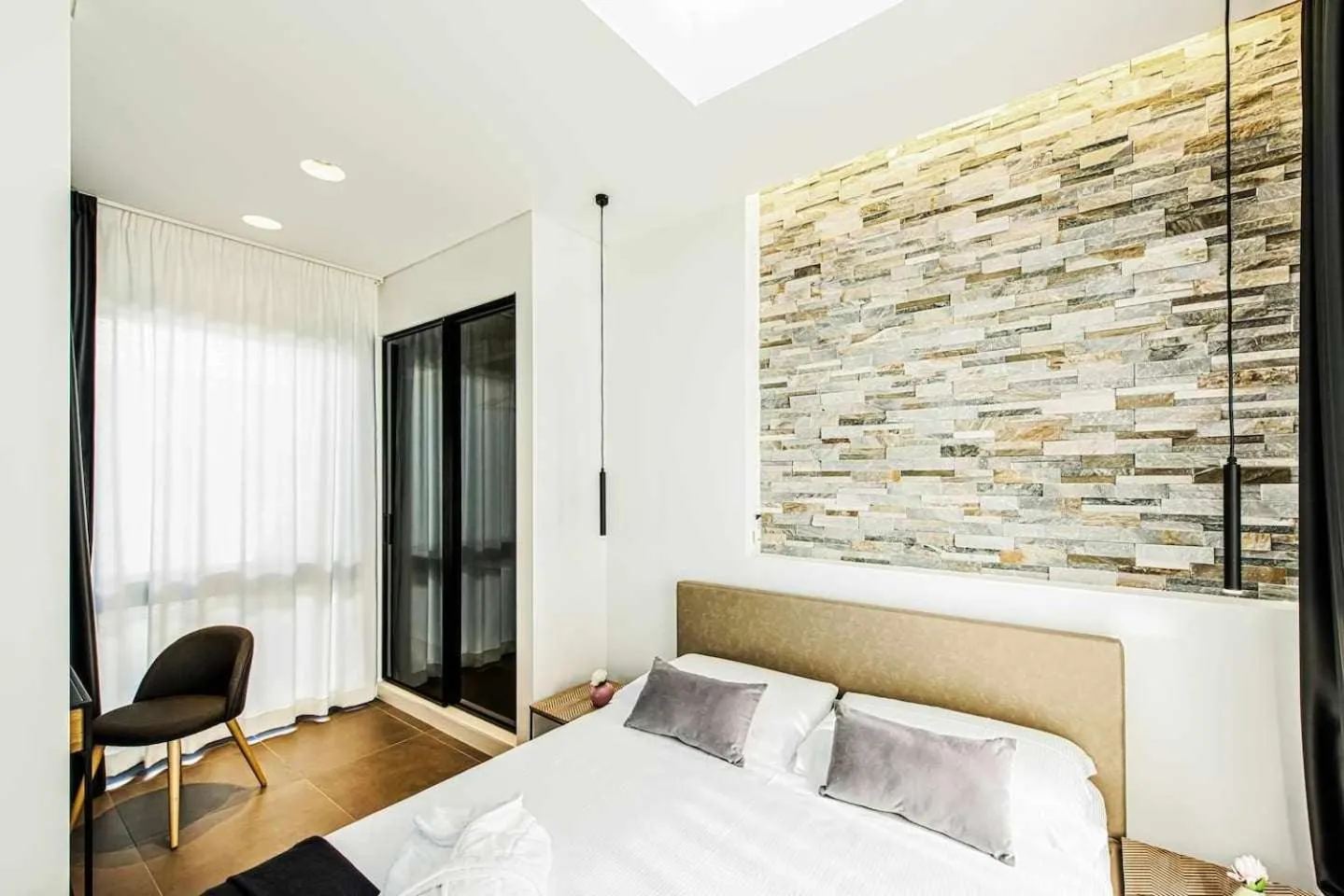 Bed in Acquarella Resort Suite