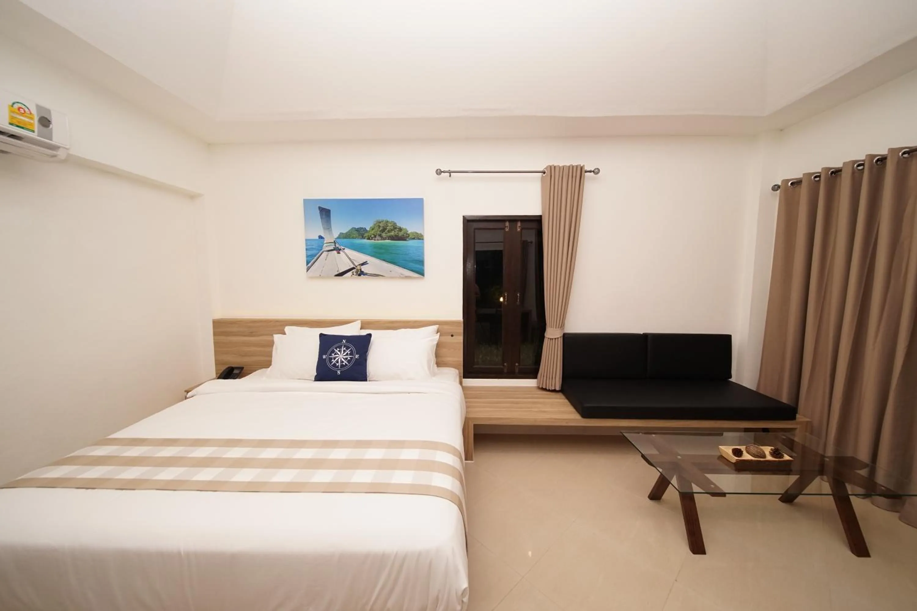 Bed in Aquavana Haad Rin Resort