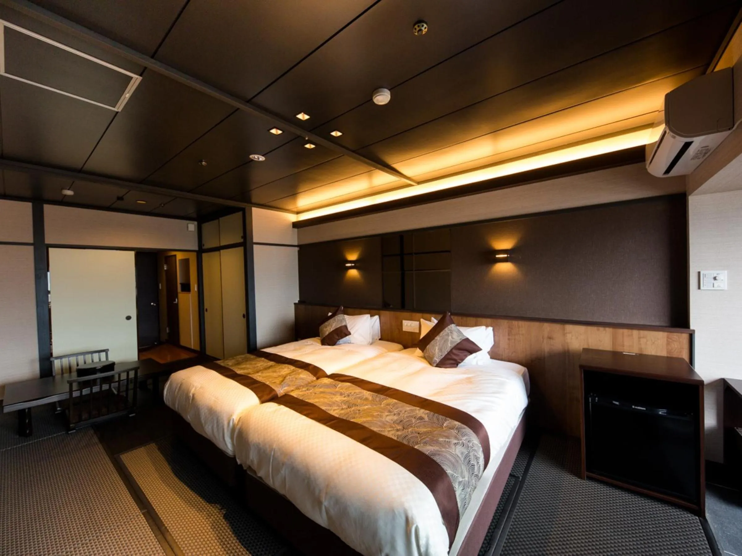 Bed in LiVEMAX RESORT Aki Miyajima