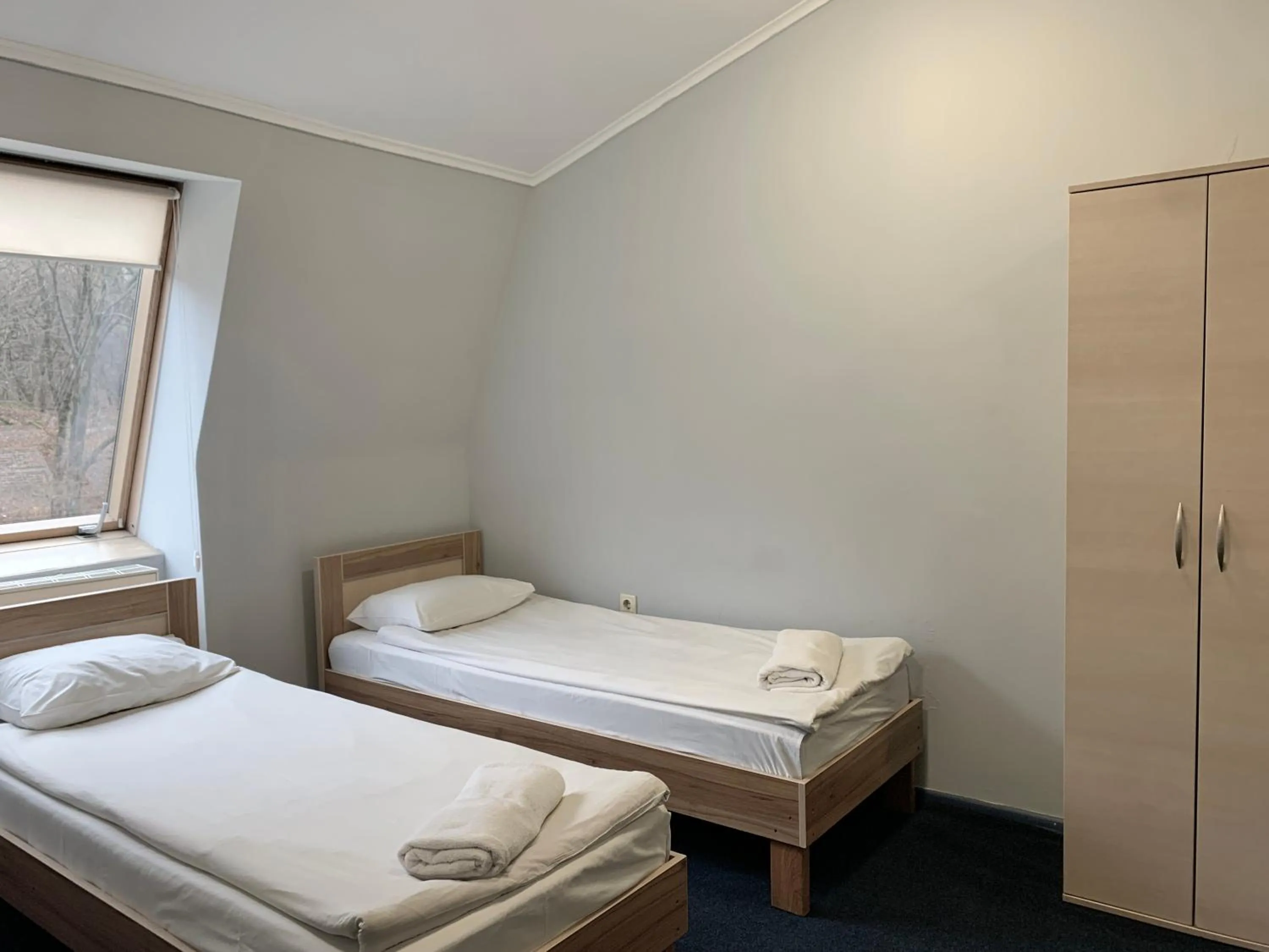 Bed in Budget Hotel Ekotel