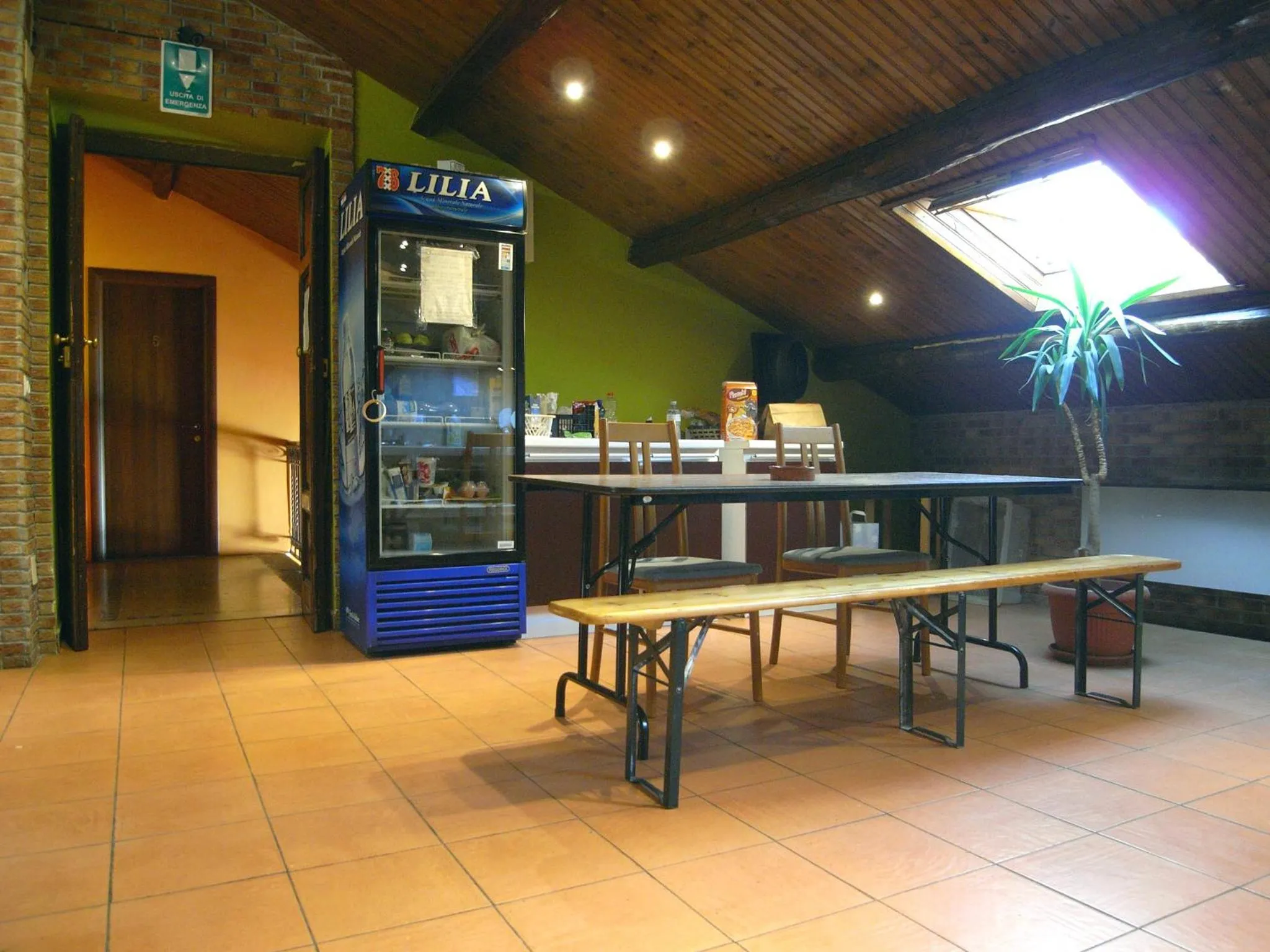 Communal lounge/ TV room in Hostel California