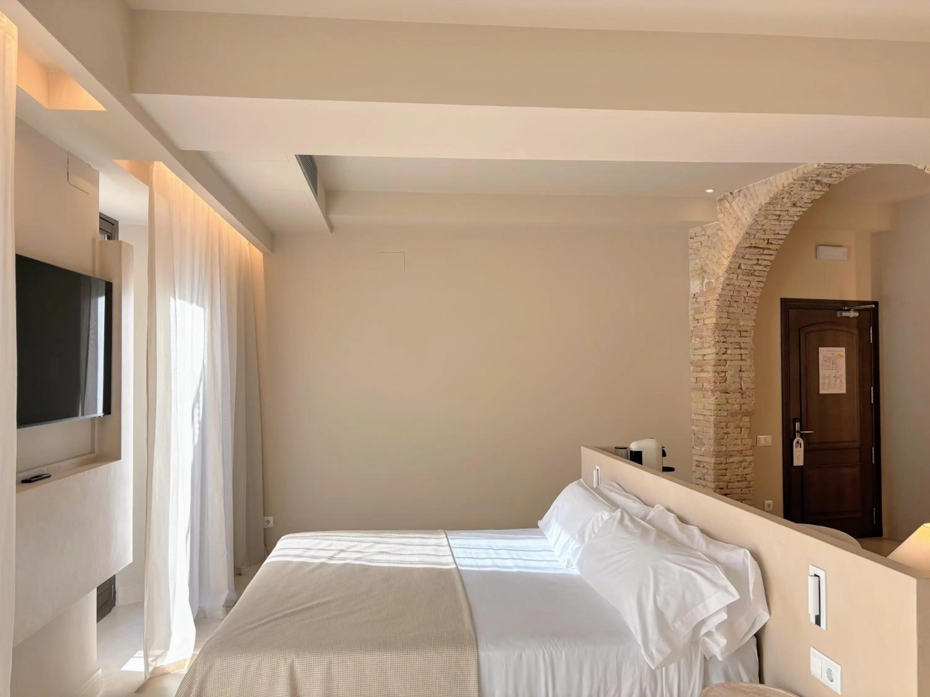 Bed in Les Clarisses Boutique Hotel