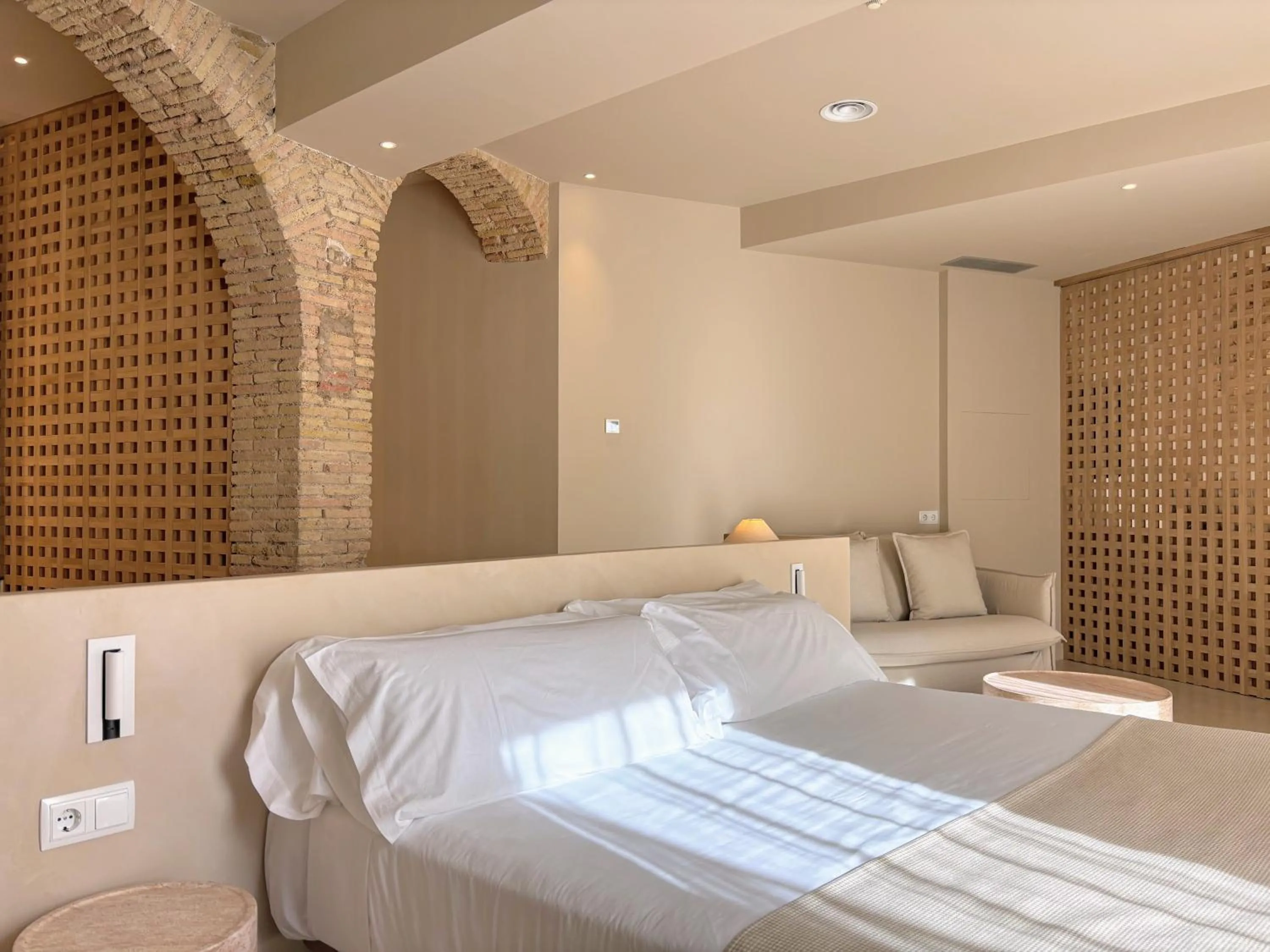 Bed in Les Clarisses Boutique Hotel