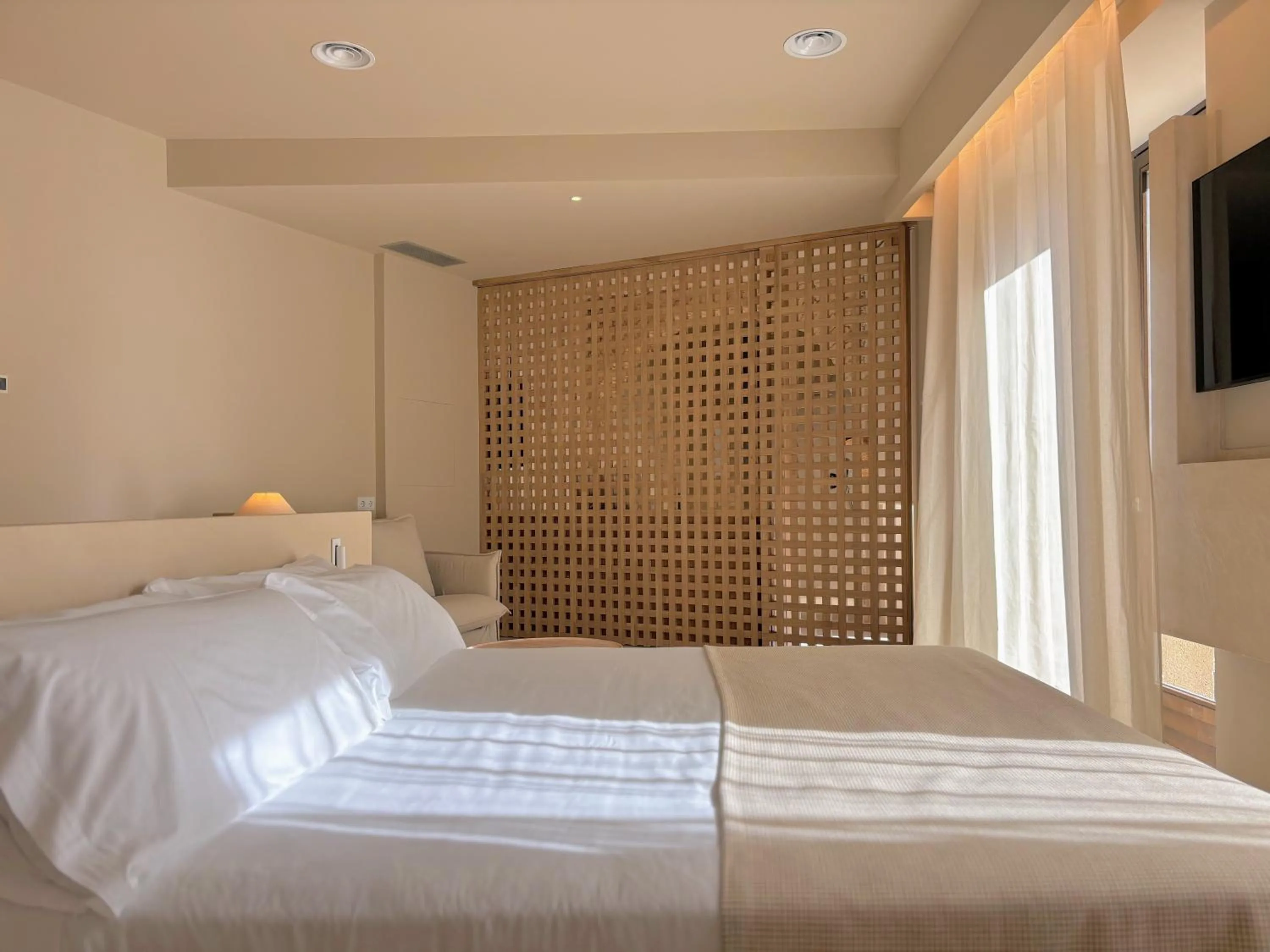 Bed in Les Clarisses Boutique Hotel
