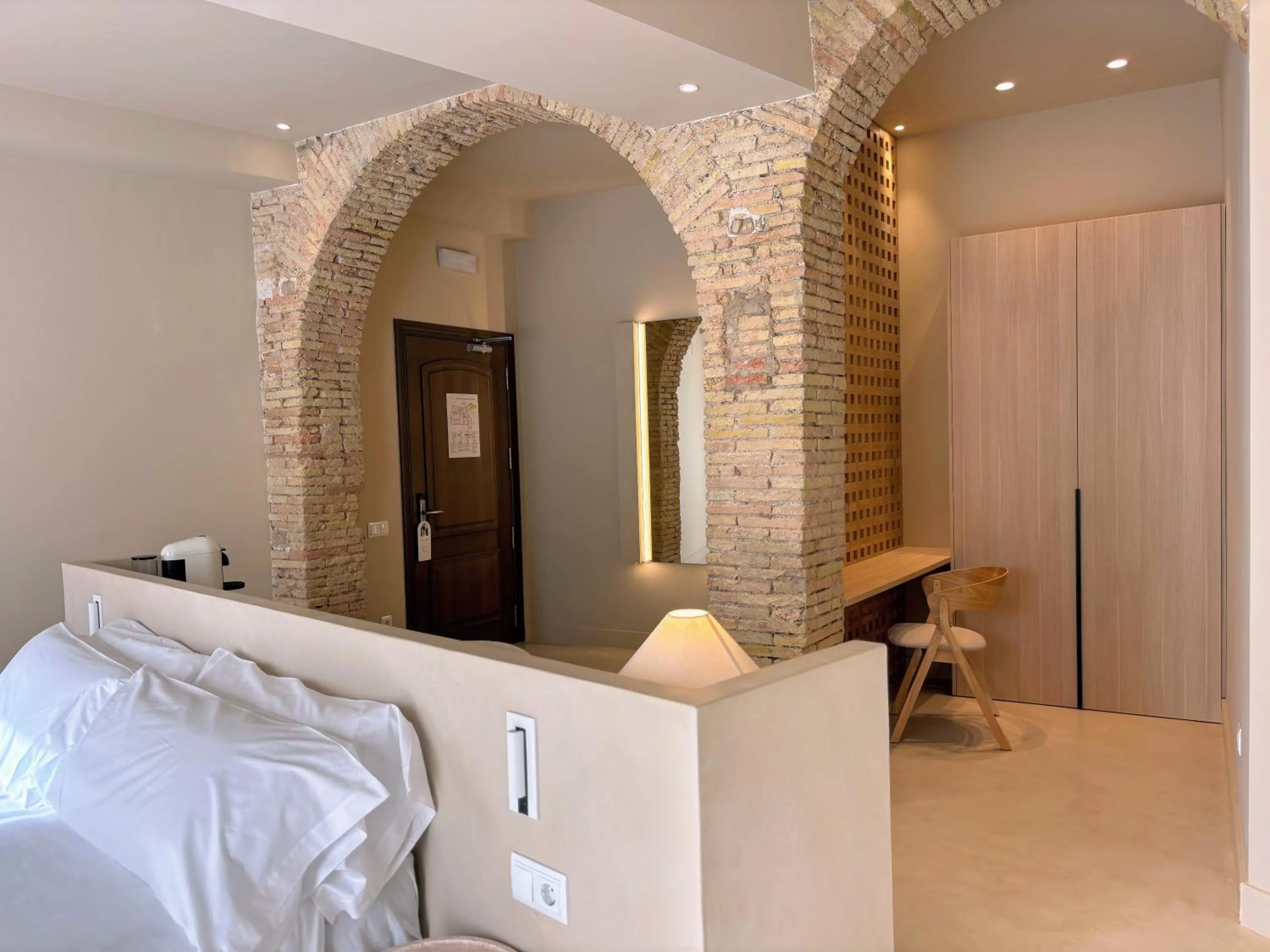 Bed in Les Clarisses Boutique Hotel