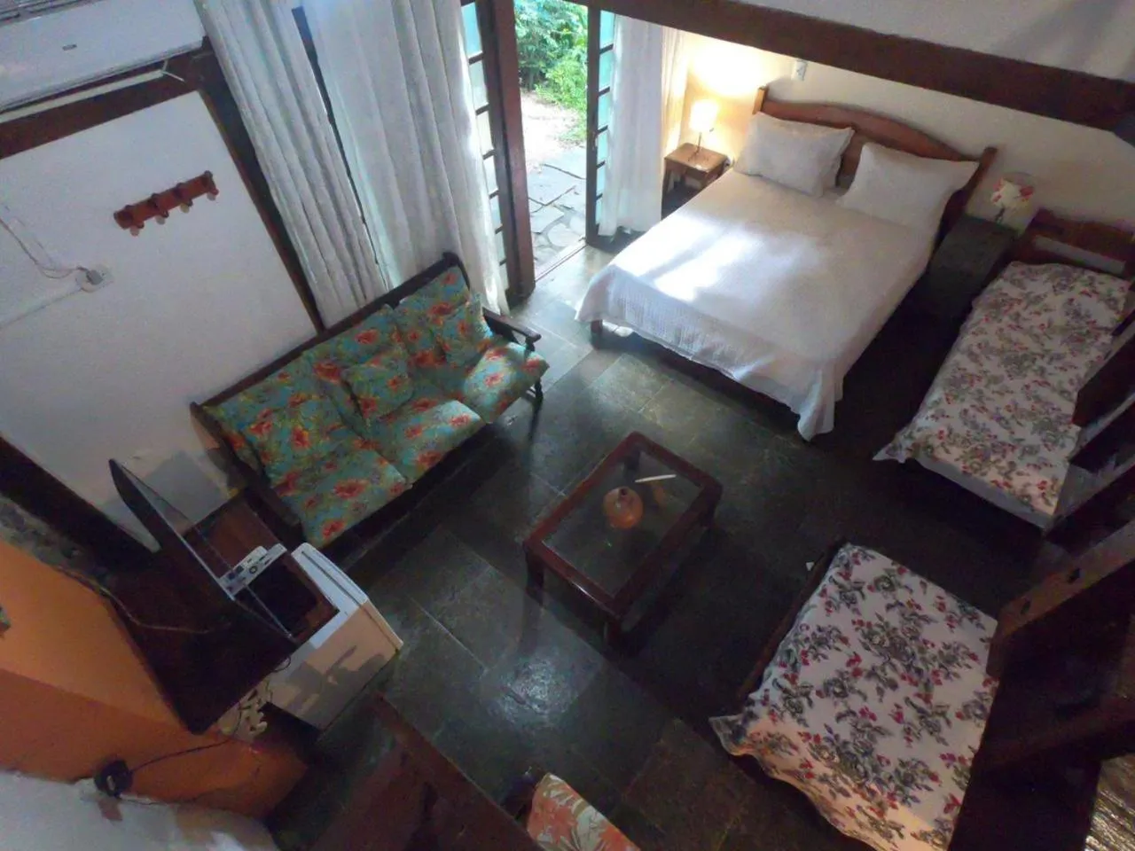 Photo of the whole room in Pousada Arte Colonial - Casarão Histórico do Séc XVIII - Lancha Própria