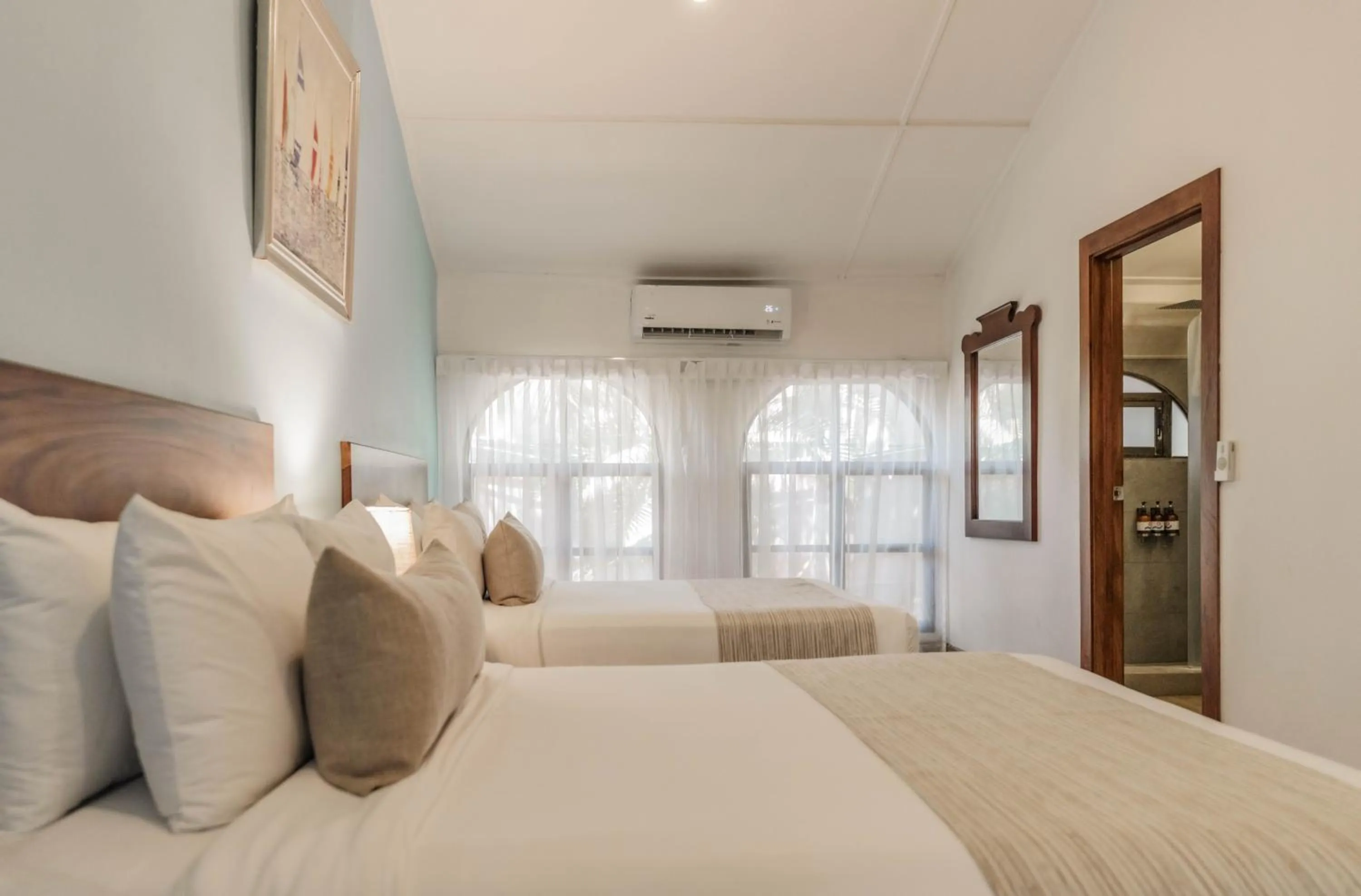 Bed in Bahia del Sol Beach front Boutique Hotel