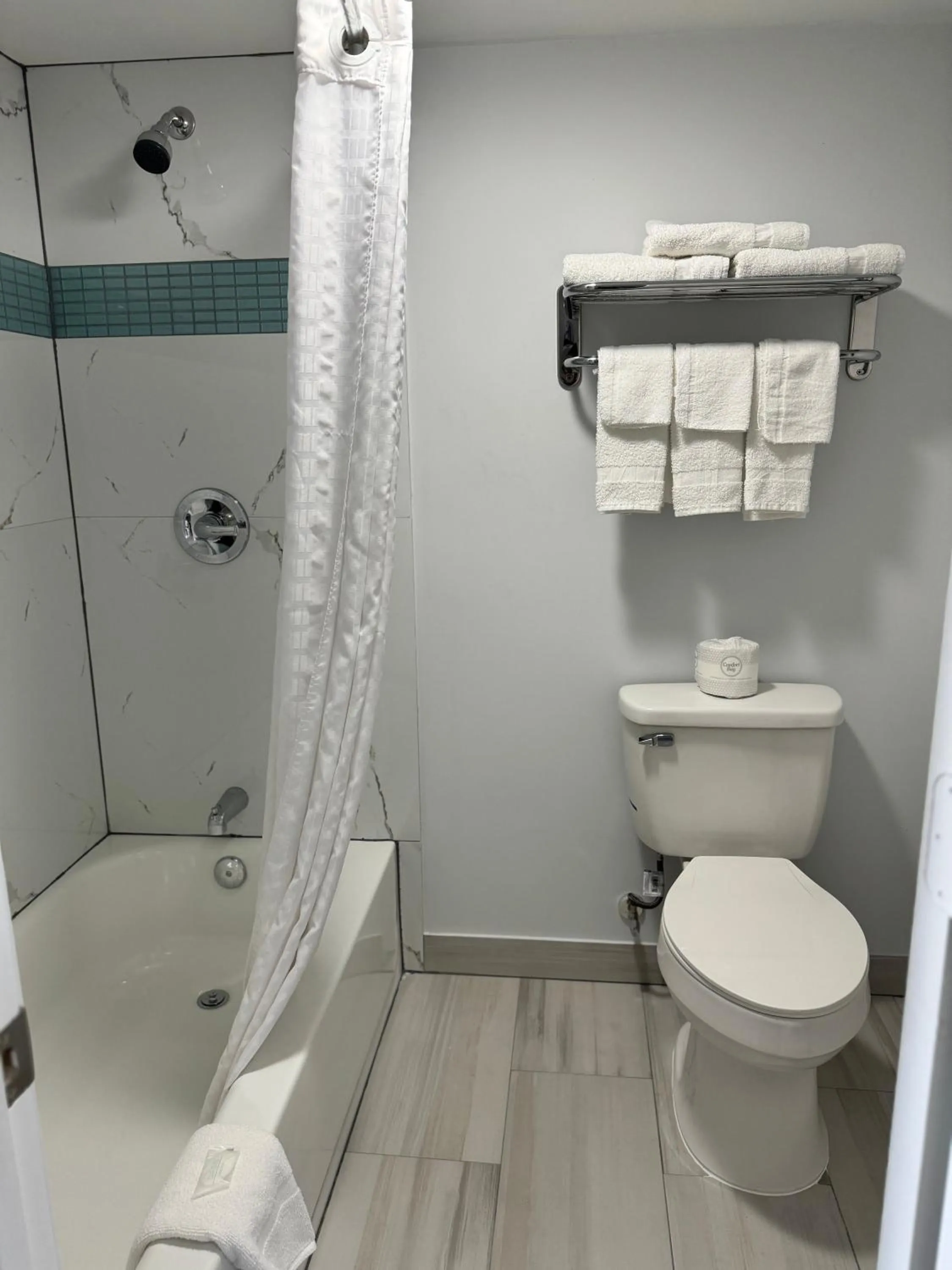 Shower in Continental Inn and Suites Nacogdoches TX SFA University Downtown