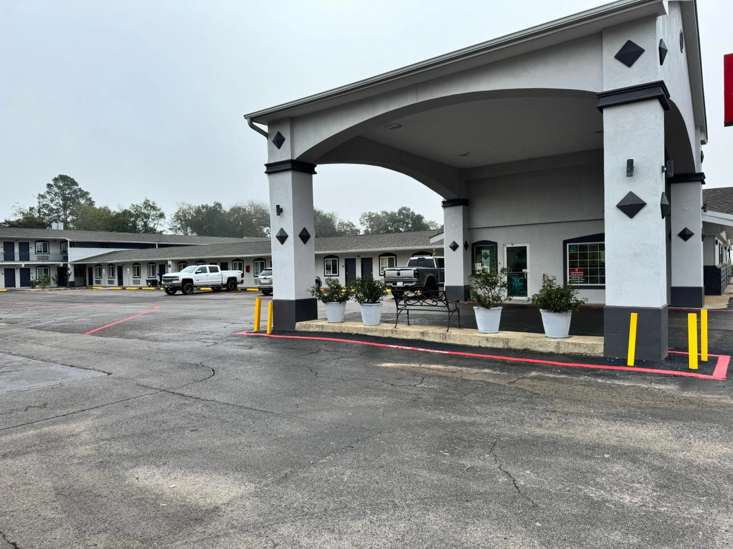 Property building in Continental Inn and Suites Nacogdoches TX SFA University Downtown