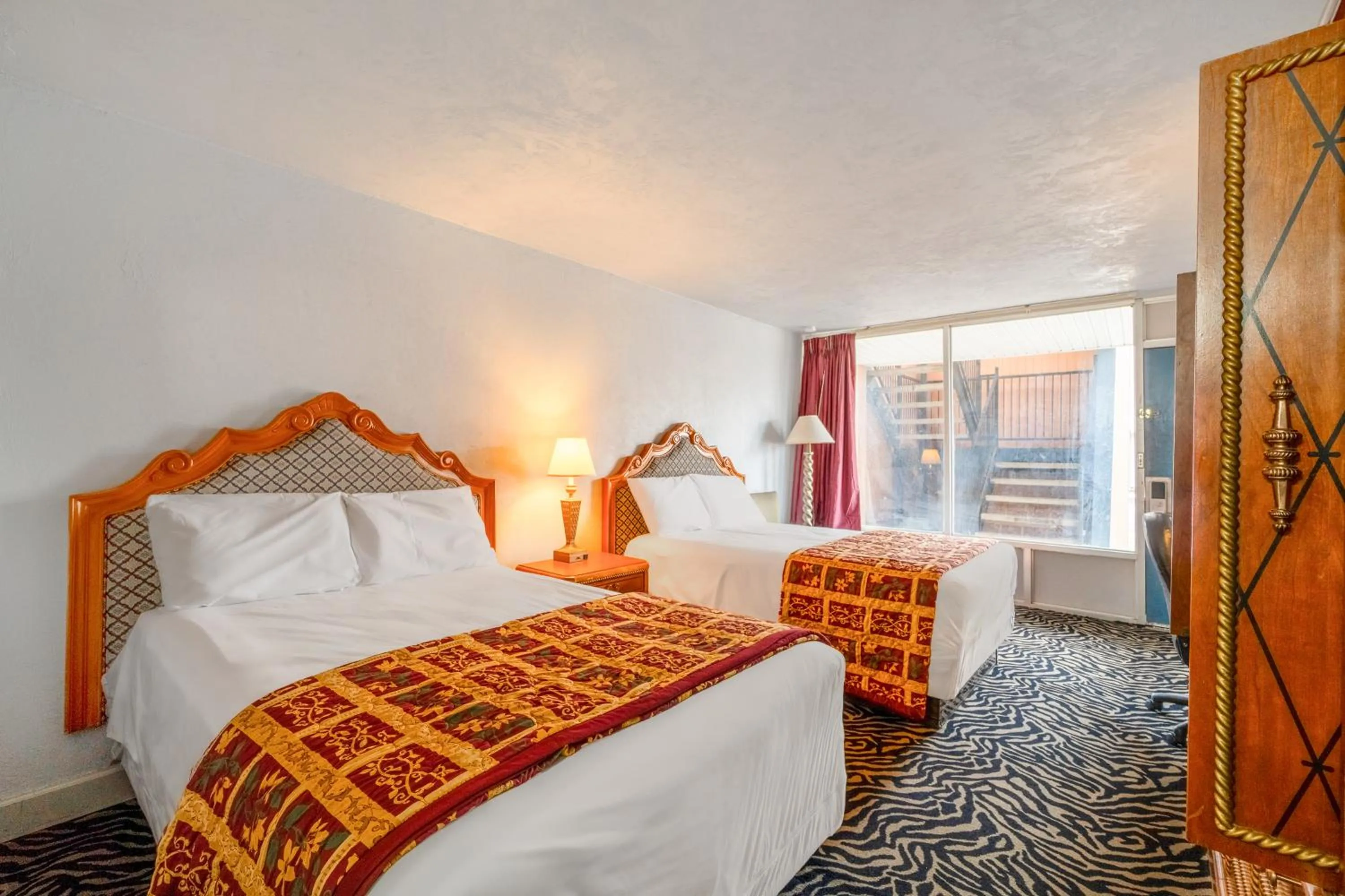 Bedroom, Bed in Castle inn & suites by OYO Lawton