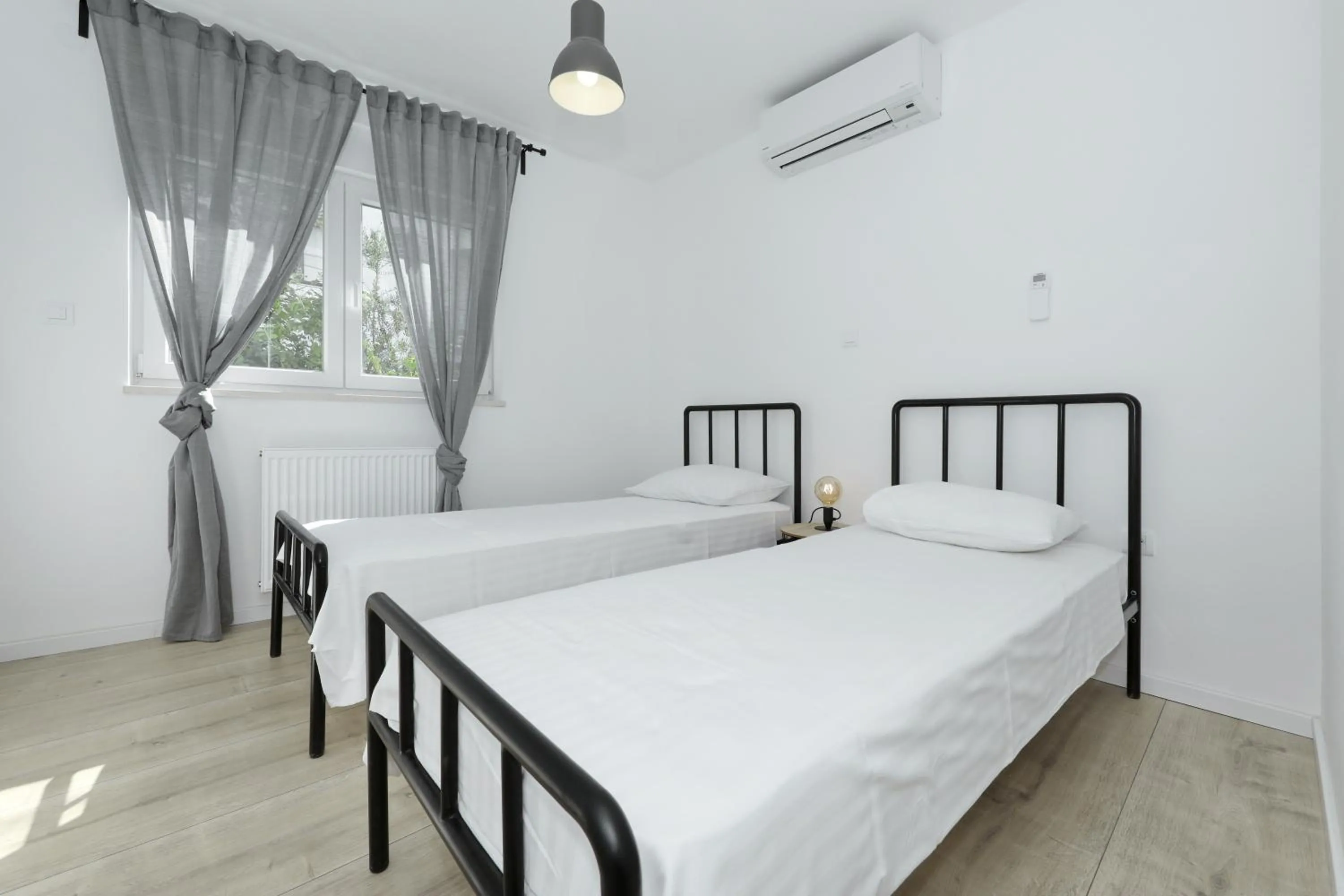 Bed in Apartments Ivanov