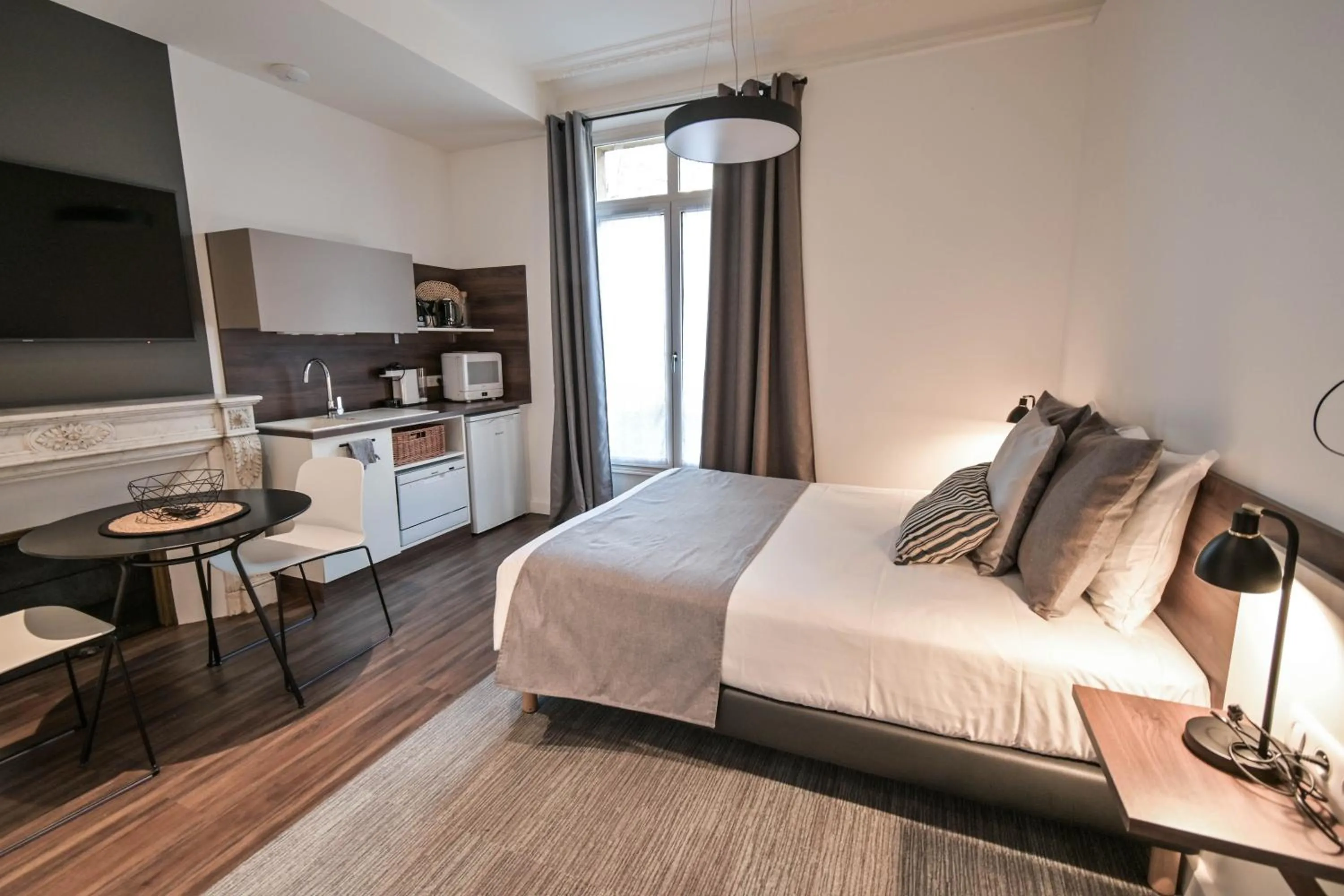 Photo of the whole room, Bed in Les cles du 27 Paris