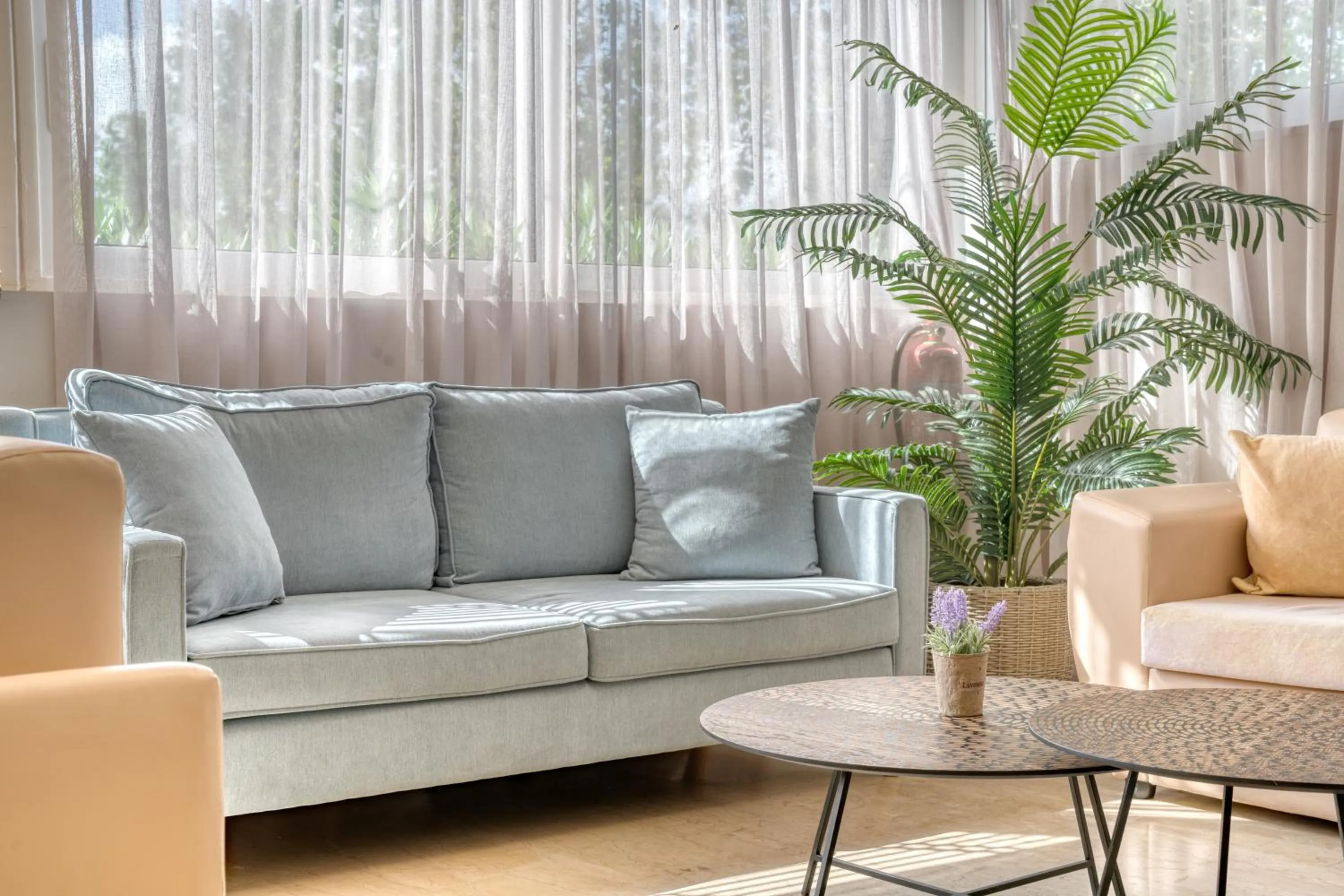 Living room in Poseidon Beach Hotel