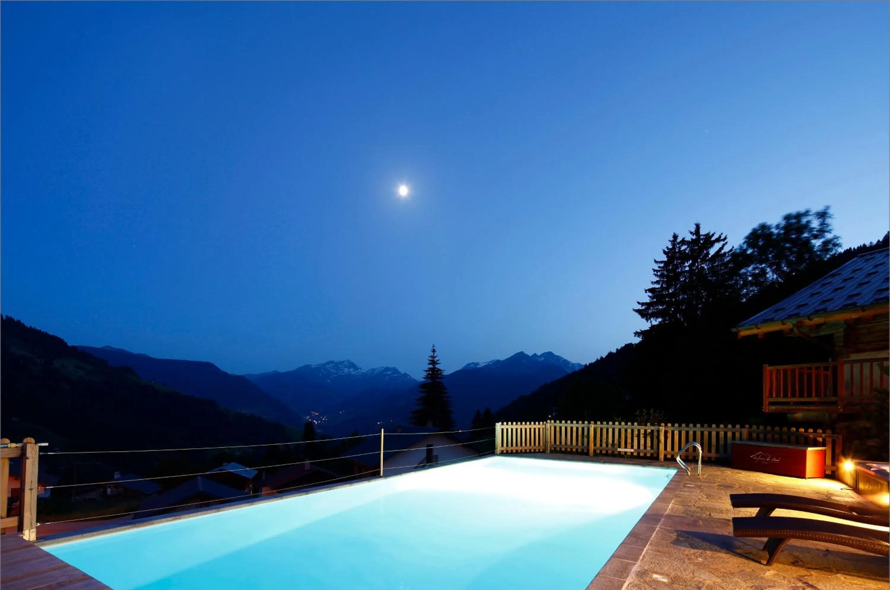 Swimming pool in Hôtel La Ferme du Chozal, Chalet de tradition