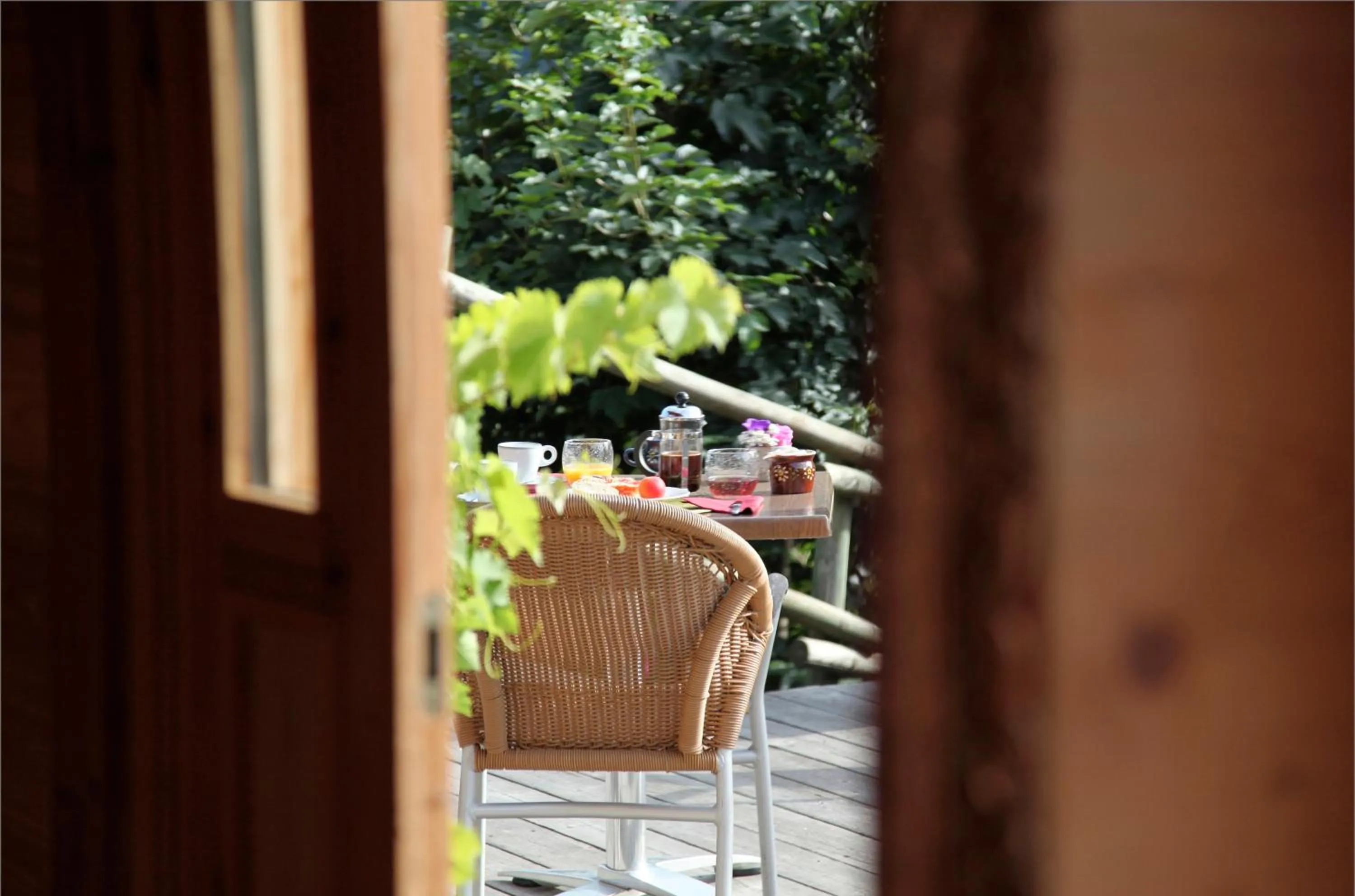Seating area in Hôtel La Ferme du Chozal, Chalet de tradition