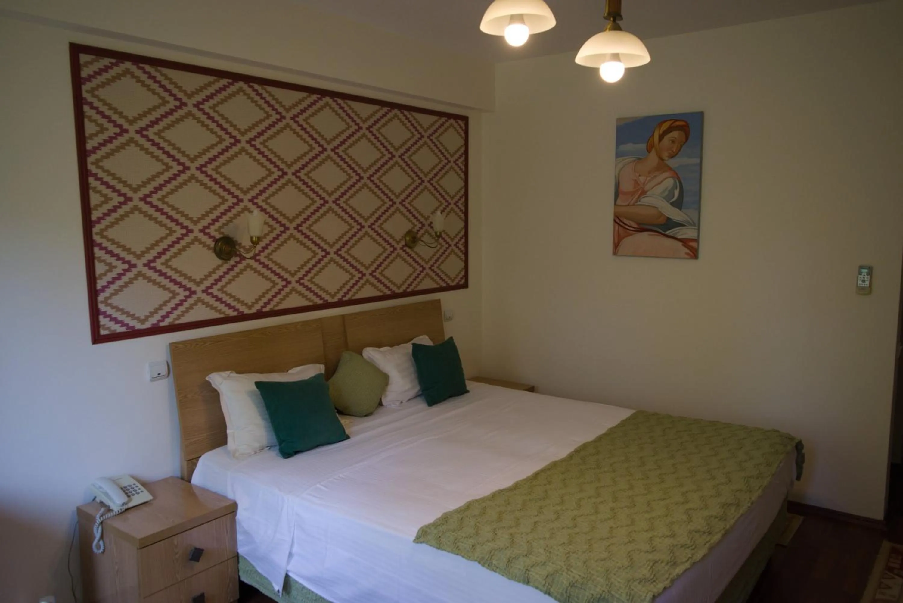 Bed in Hotel Michelangelo