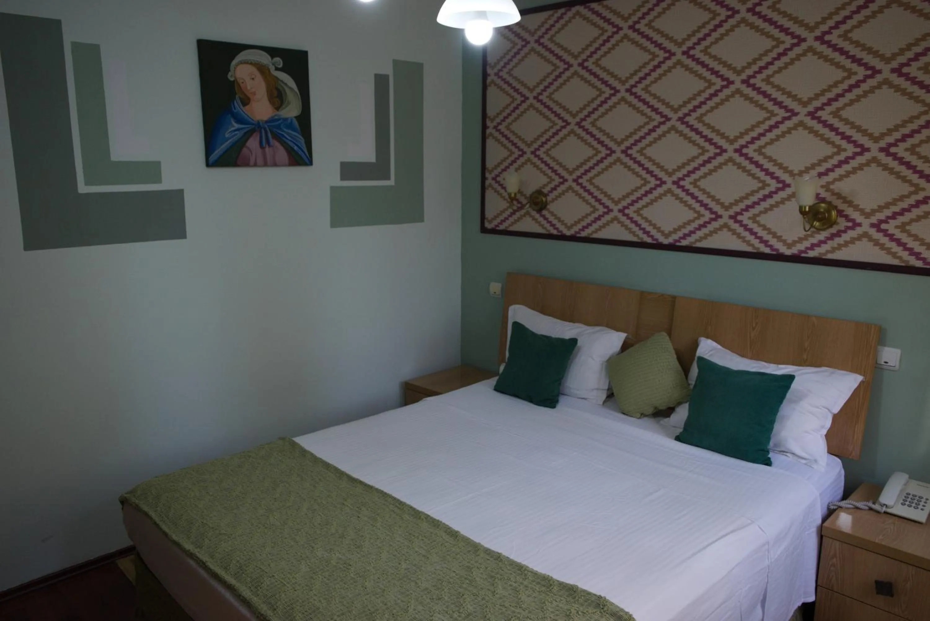 Bed in Hotel Michelangelo