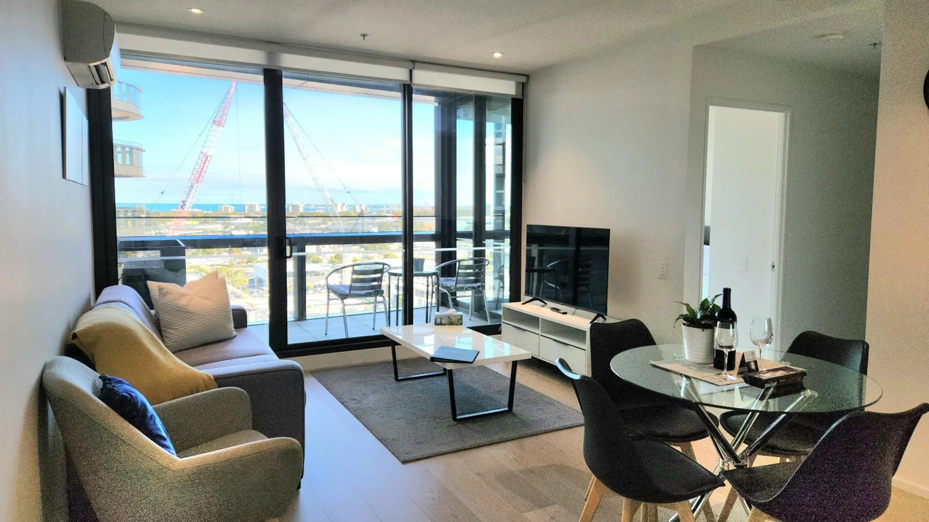 Living room in Melbourne Lifestyle Apartments - Best Views on Collins