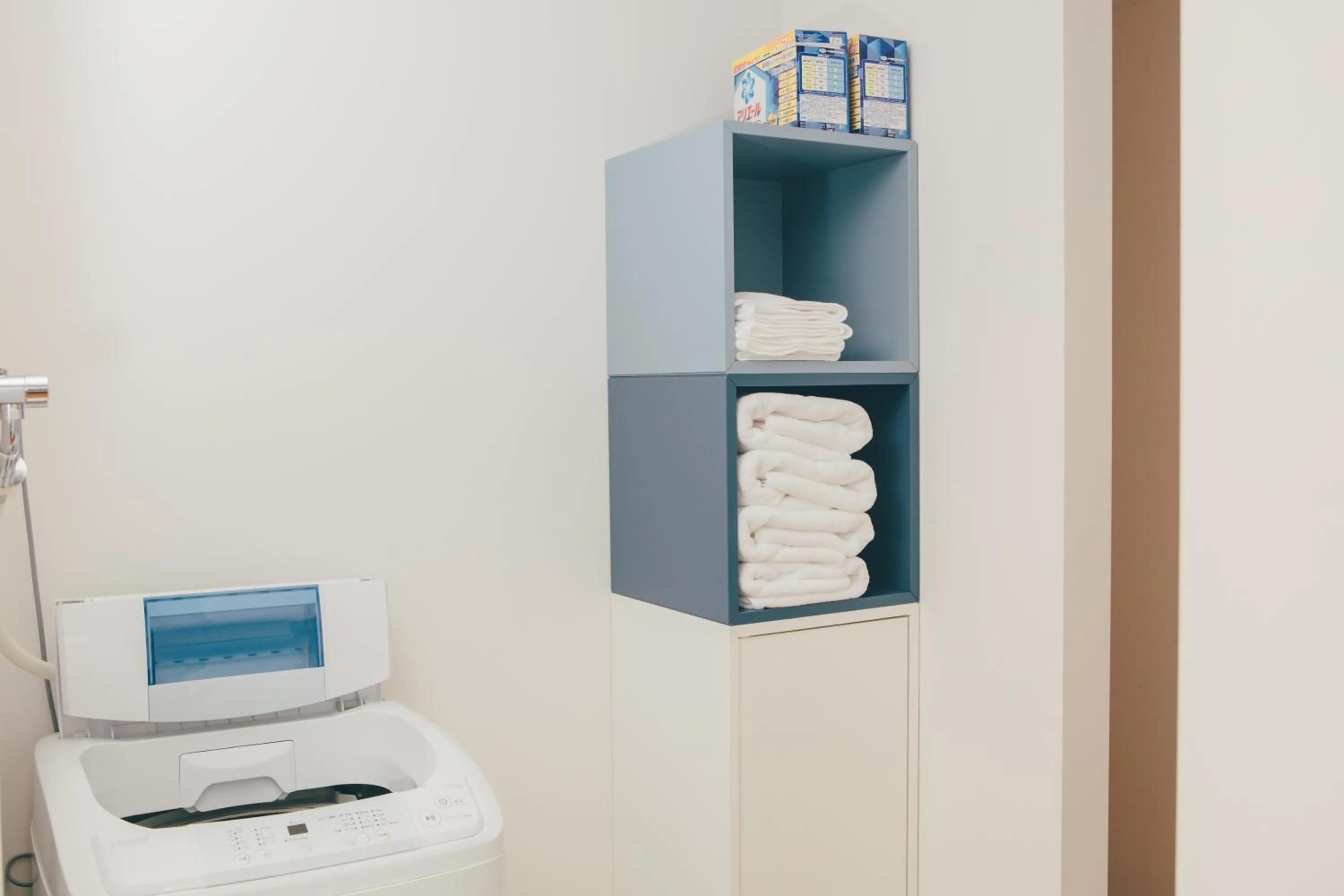 washing machine in DOMO Hotel