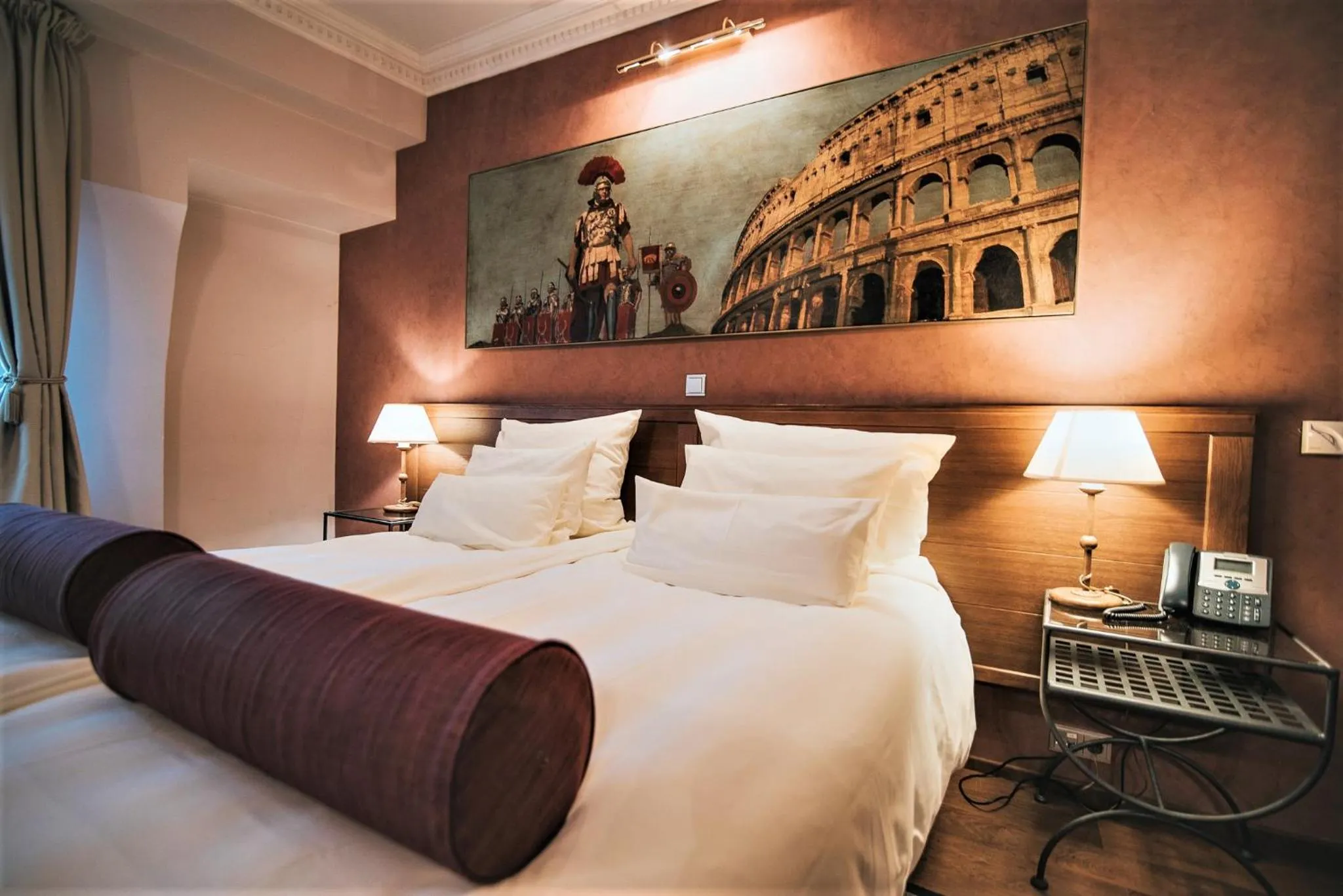 Bed in Hotel Mitra, Story Hotels