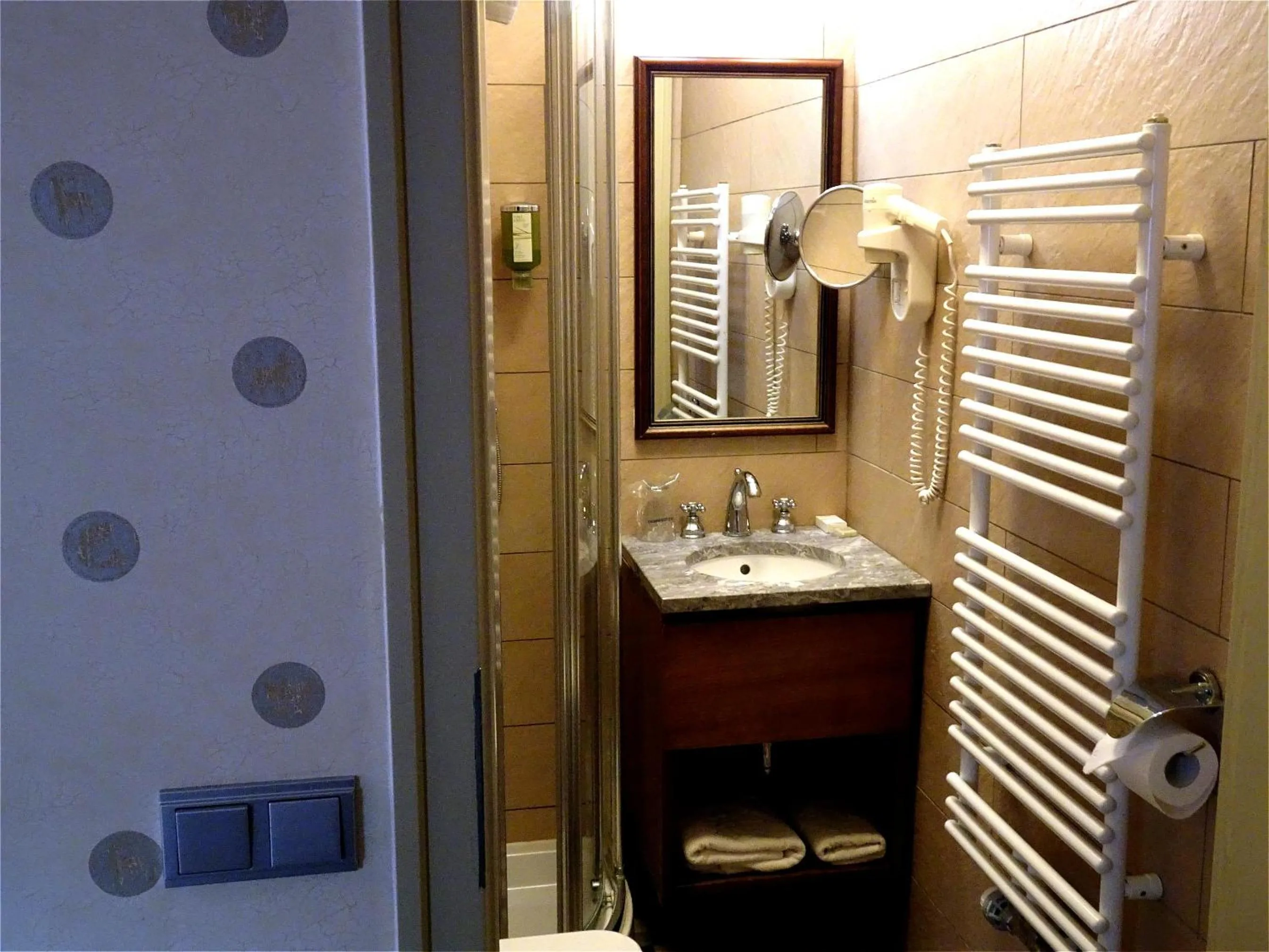 Bathroom in Hotel Mitra, Story Hotels