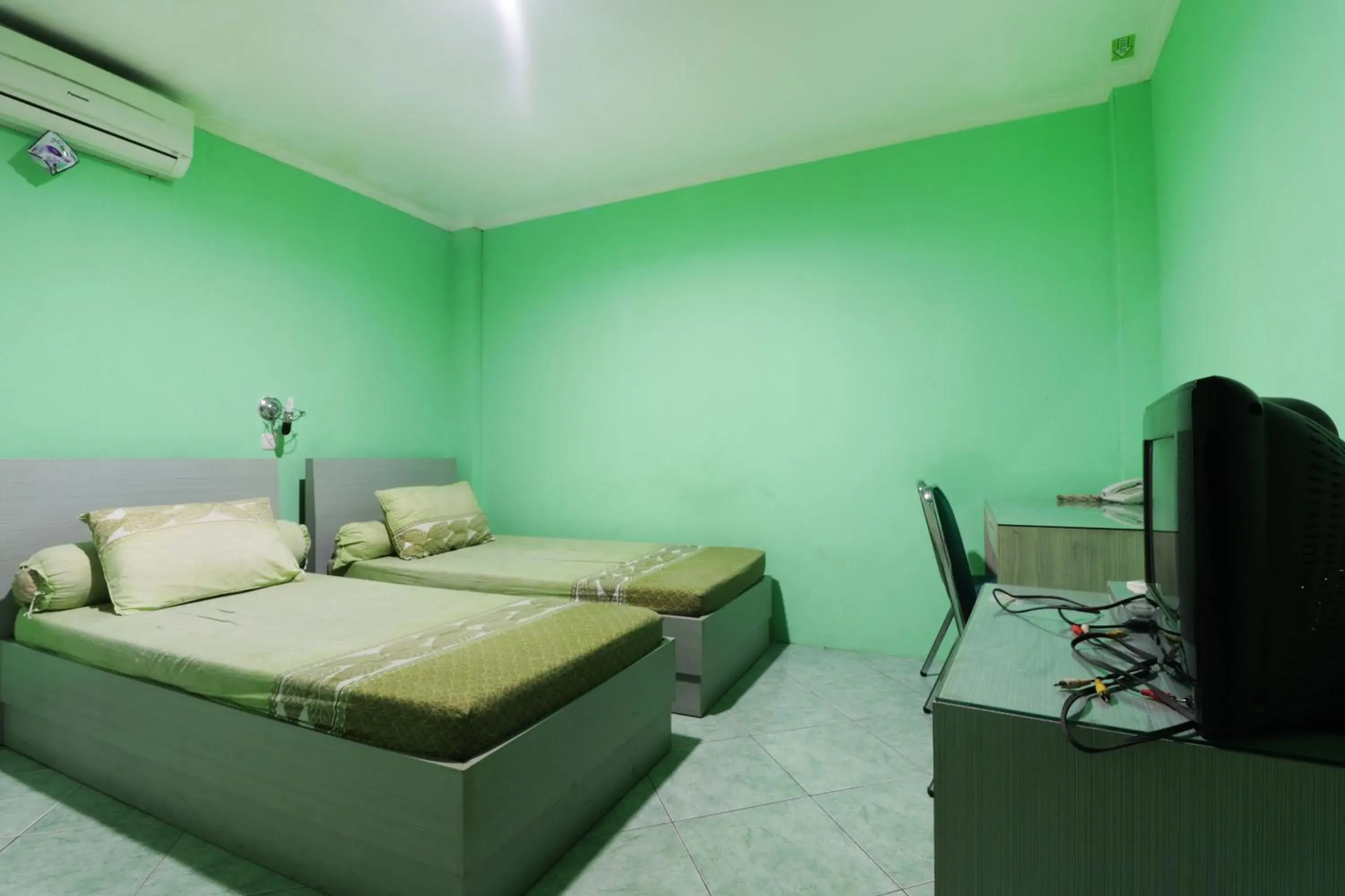 Twin Room in Wisma Aam Syariah Twin Room in Wisma Aam Syariah