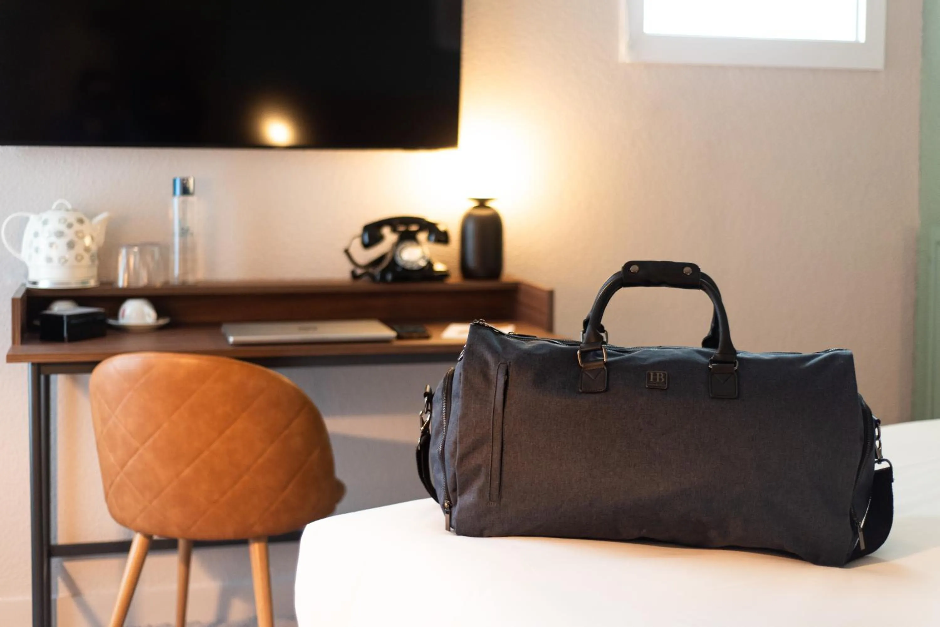 Bed in La Maison OBONO Hôtel & Spa