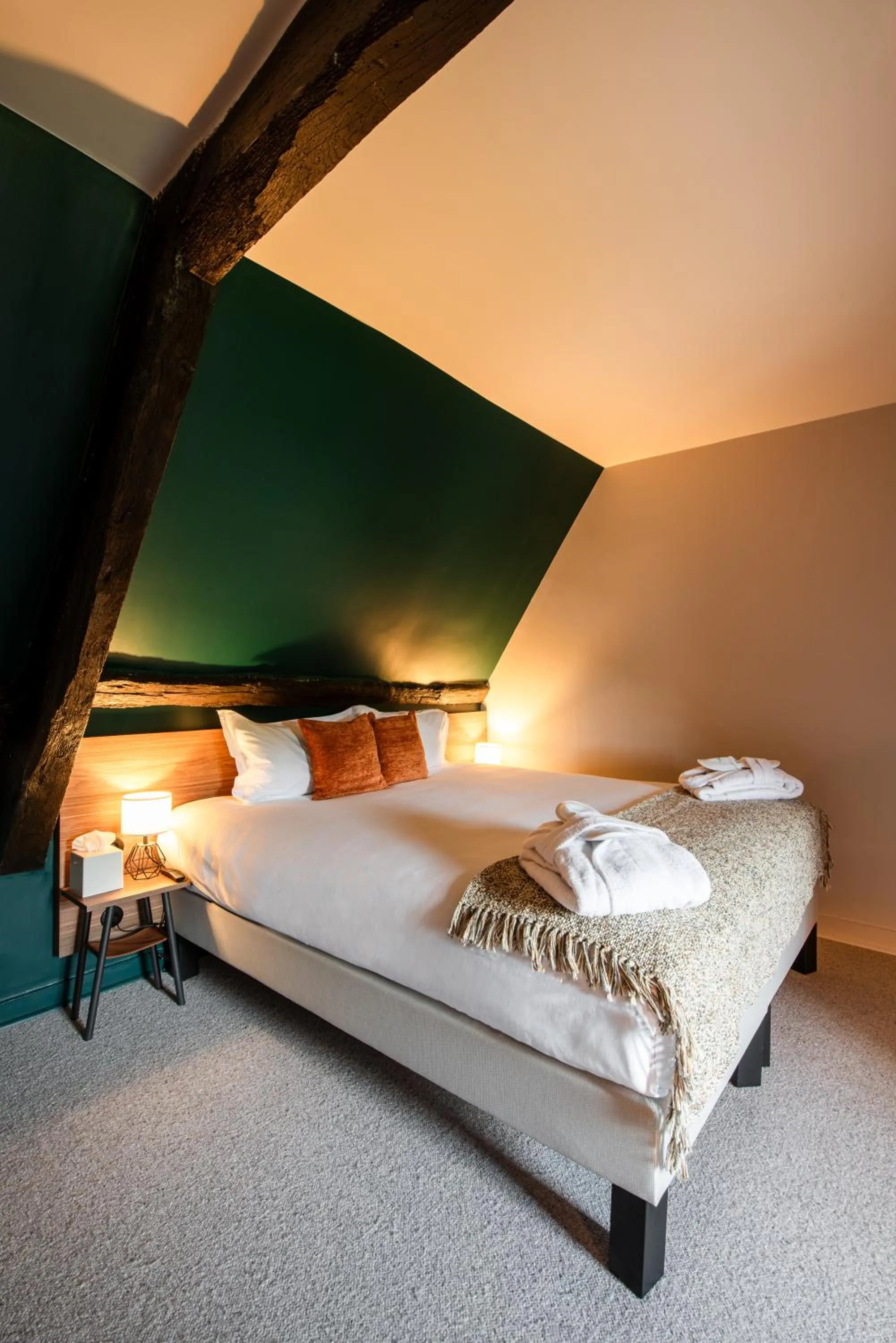 Bed in La Maison OBONO Hôtel & Spa