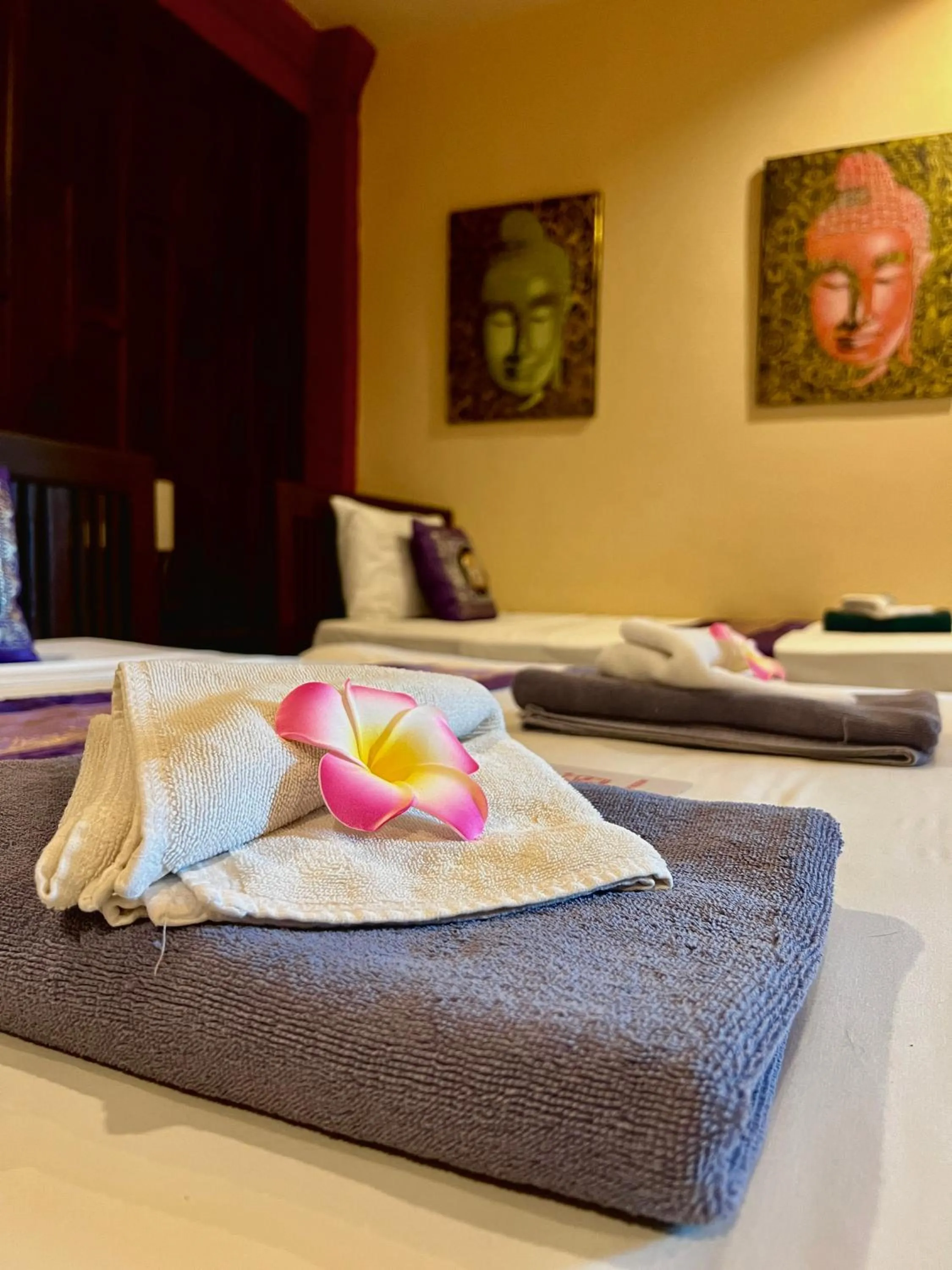 Bed in Baan Ton Rak Boutique Resort