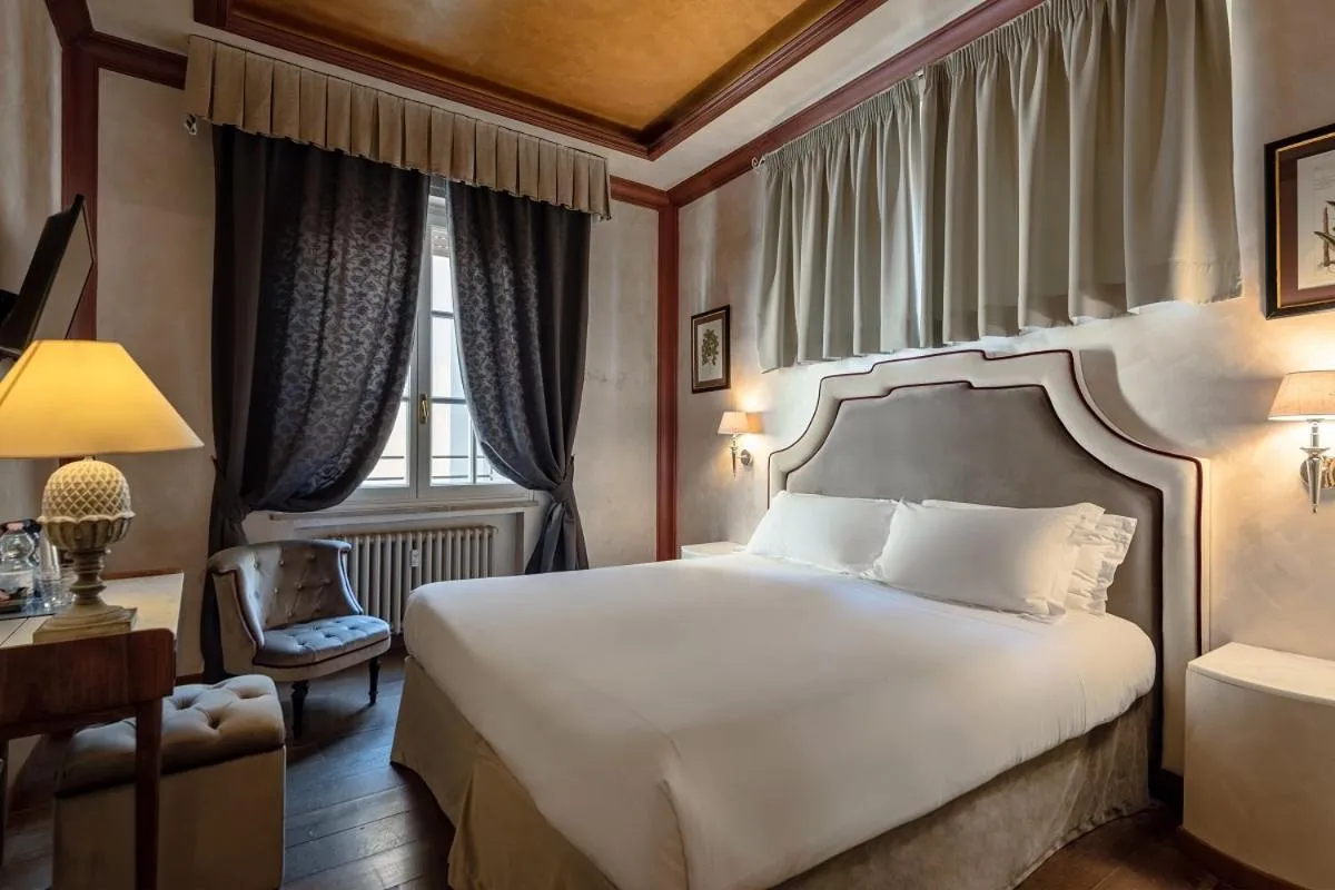 Photo of the whole room, Bed in Residenza Gambrinus